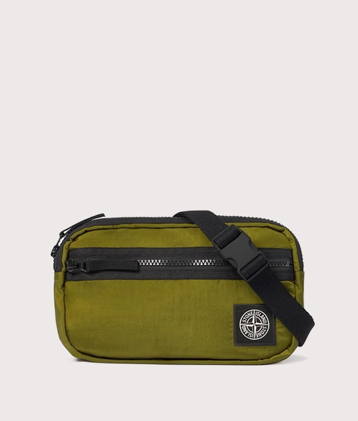 Stone Island Coated Nylon Metal in Econyl® Belt Bag in Cactus at EQVVS Menswear. Front shot.