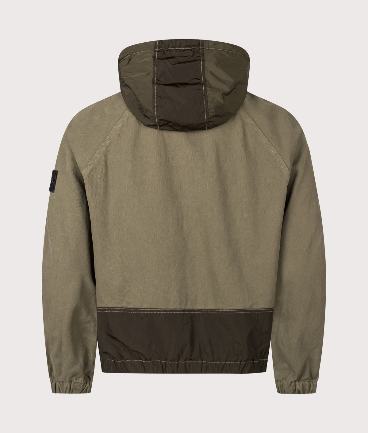 Stone Island Zip Through Lightweight Hooded Jacket in Military Green at EQVVS Menswear. Back shot.