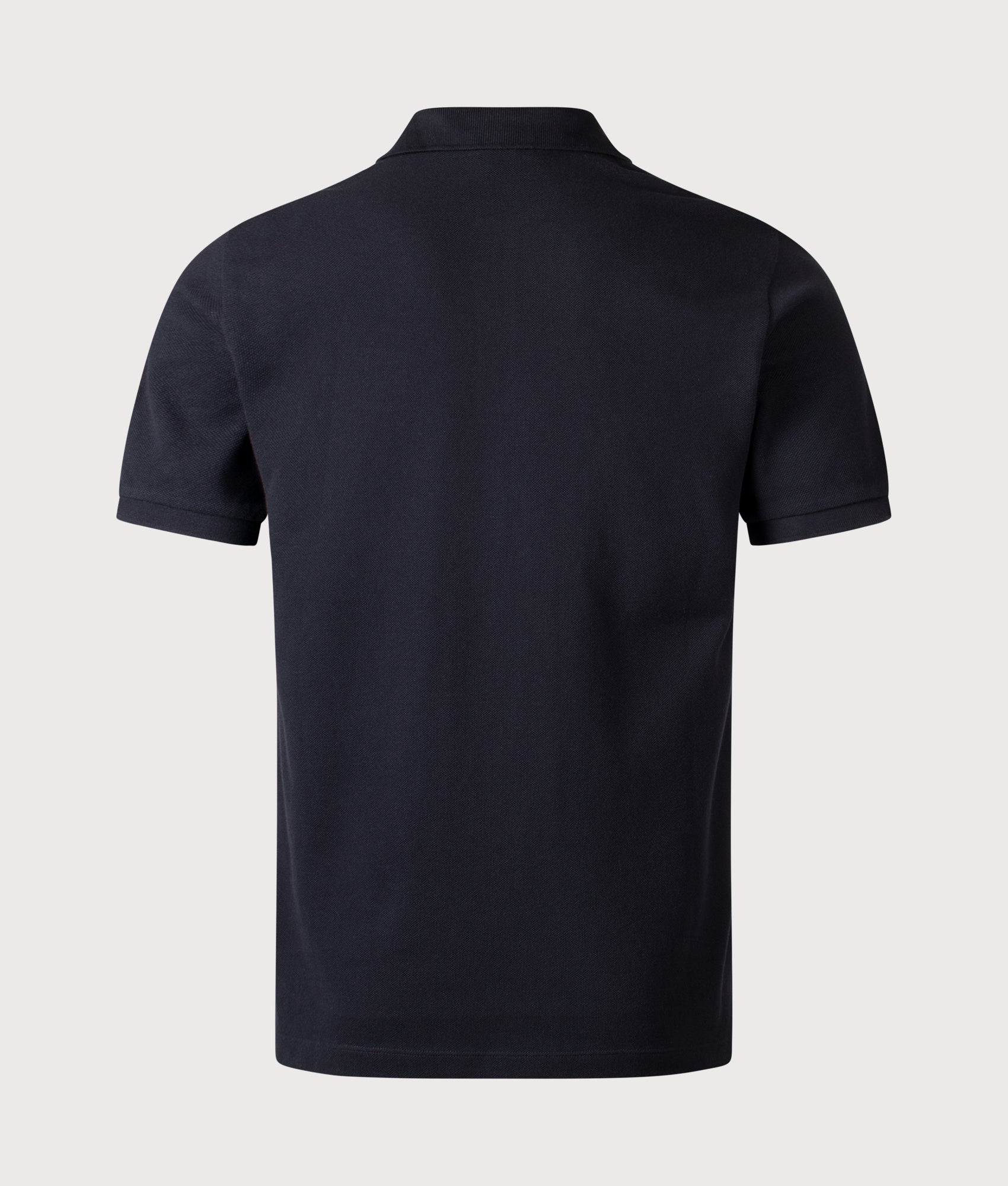 Stone Island Compass Patch Polo Shirt in Navy Blue at EQVVS Menswear. Back shot.