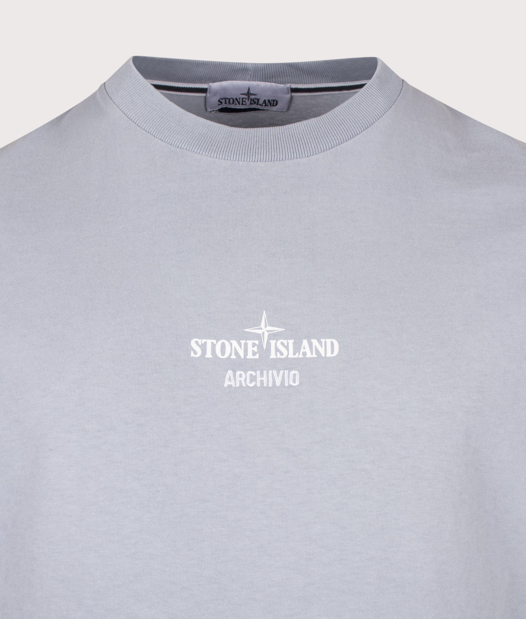 Stone Island Regular Fit ‘ARCHIVIO’ print T-Shirt in Ash Grey at EQVVS Menswear. Detail shot.