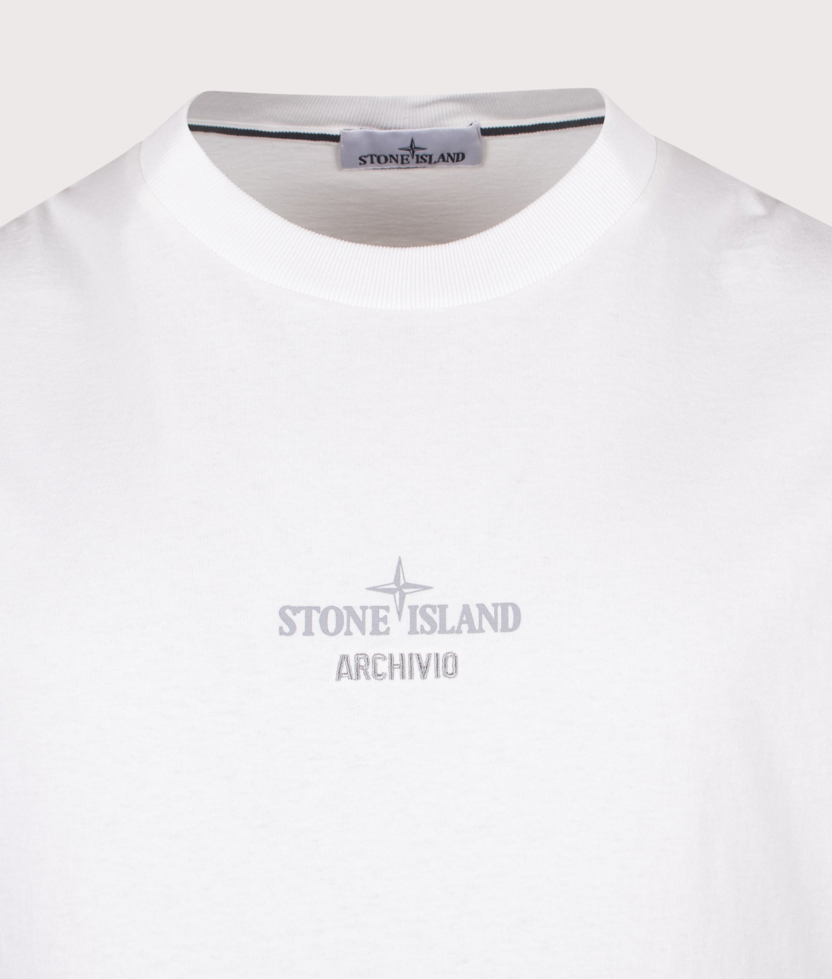 Stone Island Regular Fit ‘ARCHIVIO’ Print T-Shirt in White at EQVVS Menswear. Detail shot.