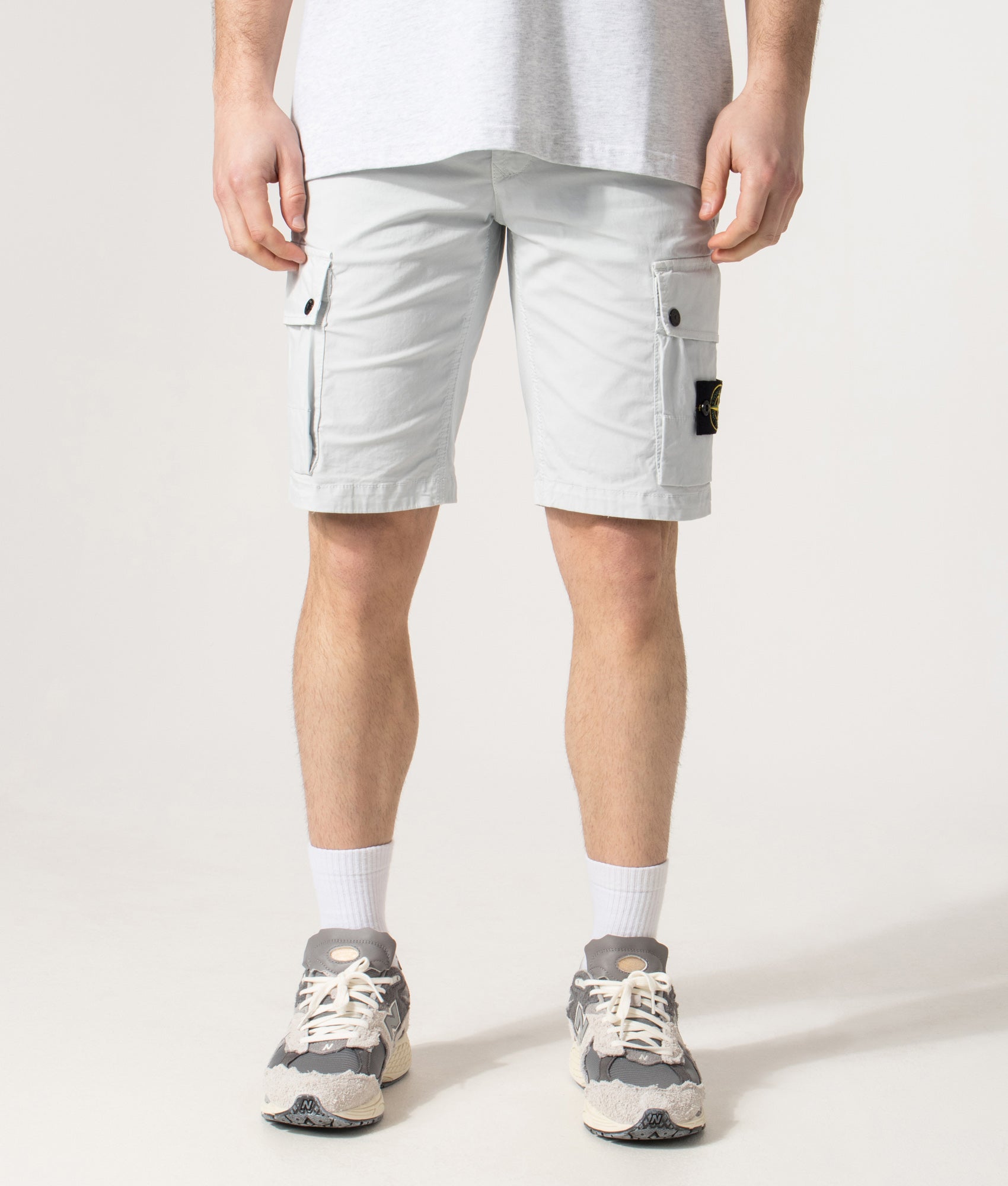 Slim Fit Cargo Bermuda Shorts in Sky Blue | Stone Island | EQVVS | Front model shot 