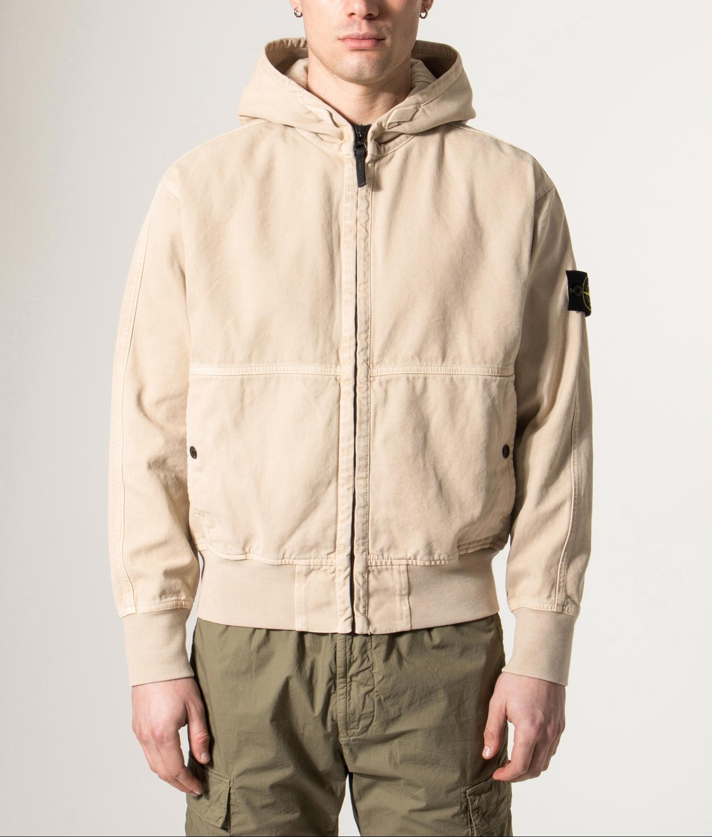 Stone Island Panama ‘Old’ Effect Zip Through Jacket in Desert Sand at EQVVS Menswear. Model front shot.