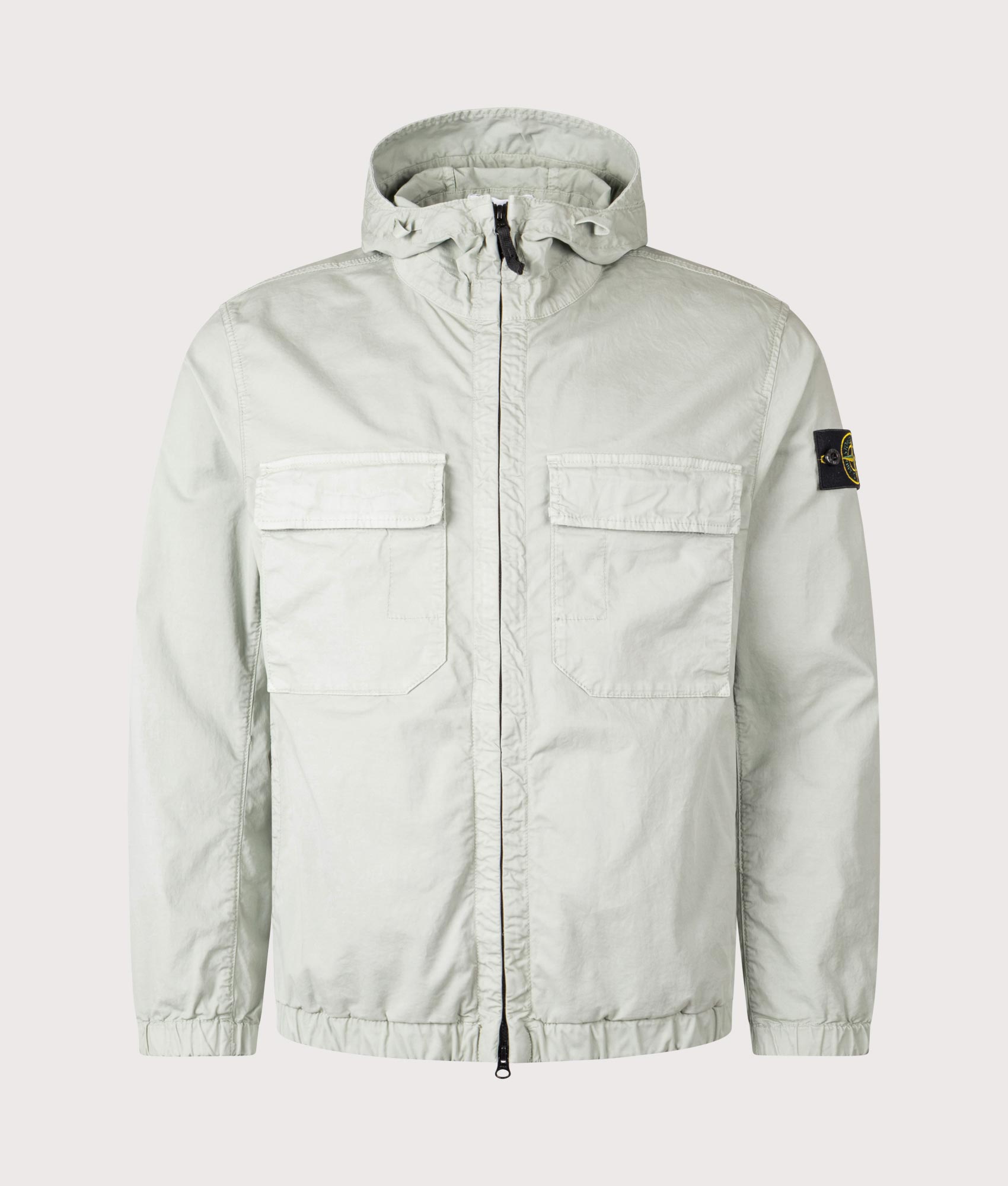 Stone Island Hooded Field Jacket in Sage at EQVVS Menswear. Front shot.