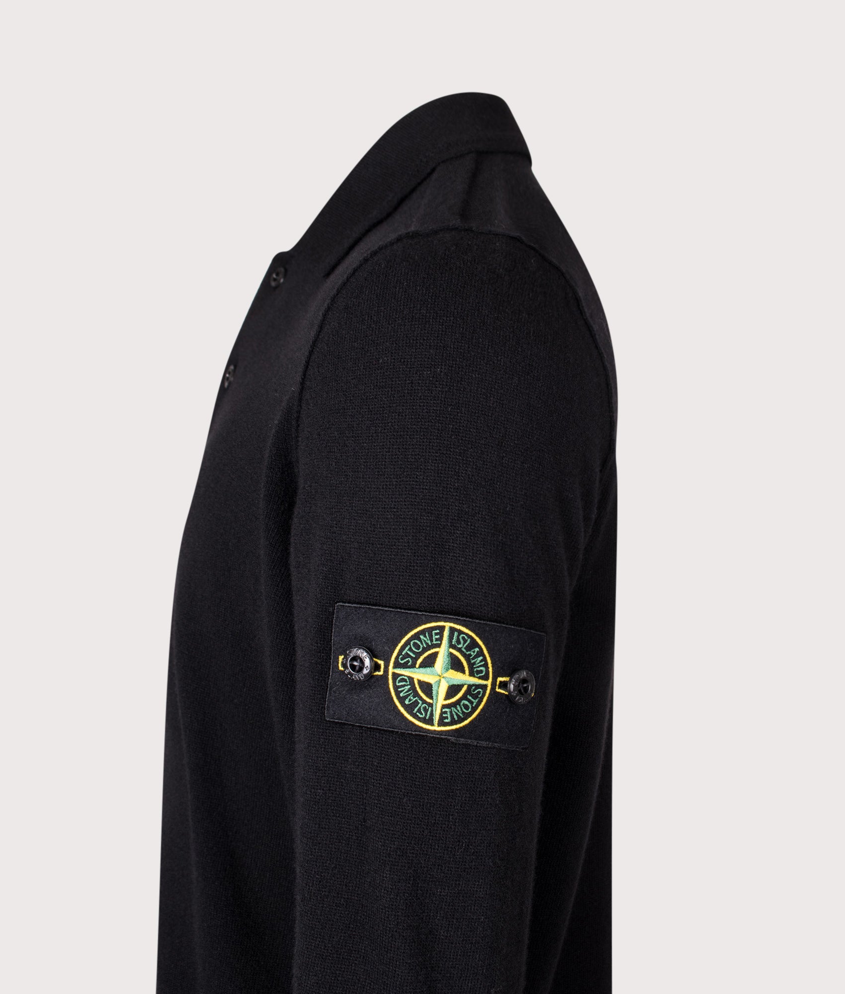 Stone Island Light RWS Geelong Wool Polo Collar Jumper in Black at EQVVS Menswear. Detail shot.