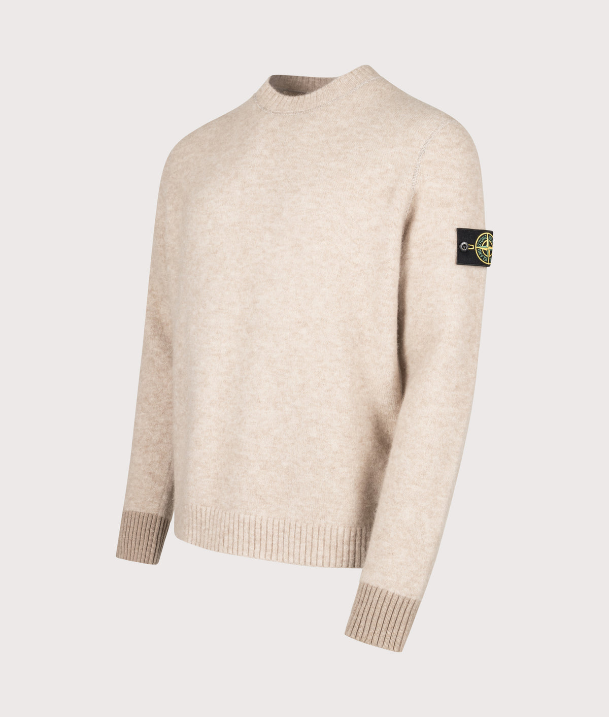 Stone Island Loose Fit Baby Alpaca Blend Crewneck Jumper in Melange Biscuit at EQVVS Menswear. Angled front shot.
