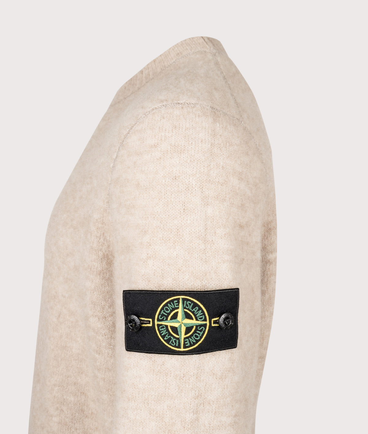 Stone Island Loose Fit Baby Alpaca Blend Crewneck Jumper in Melange Biscuit at EQVVS Menswear. Detail shot.