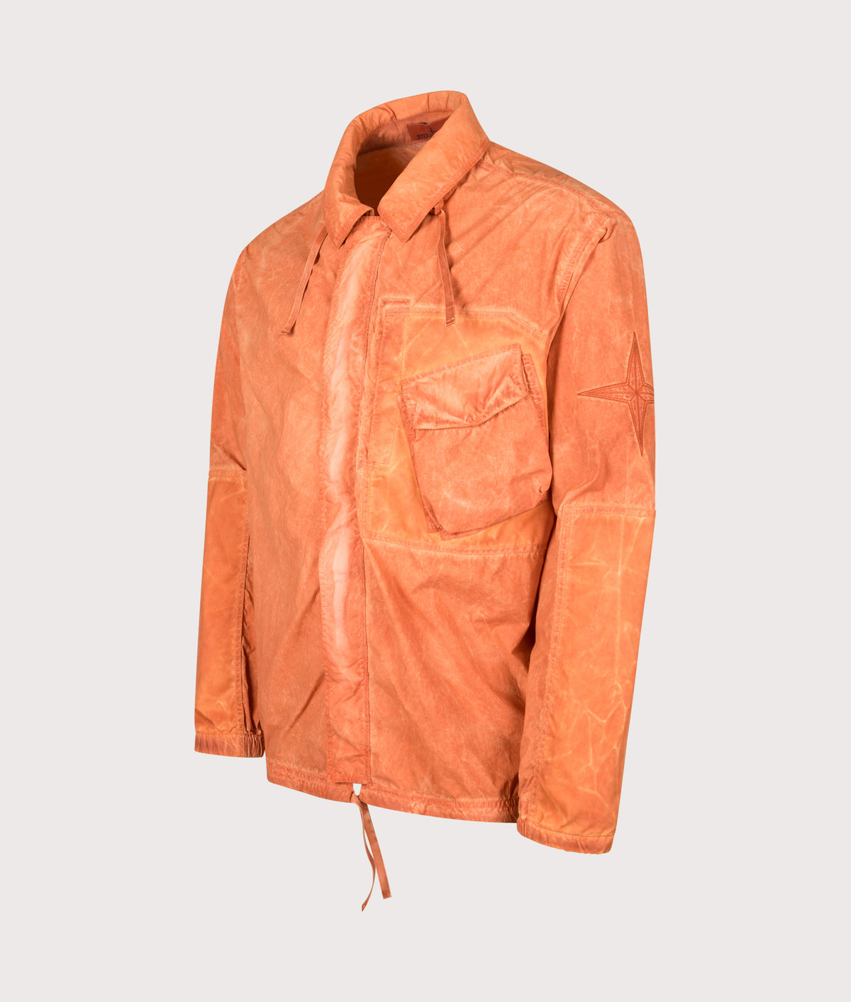 Stone Island Uneven Pigment Dyed Nylon Smerigliato + Nylon Canvas Overshirt in Burnt Orange at EQVVS Menswear. Angled front shot.