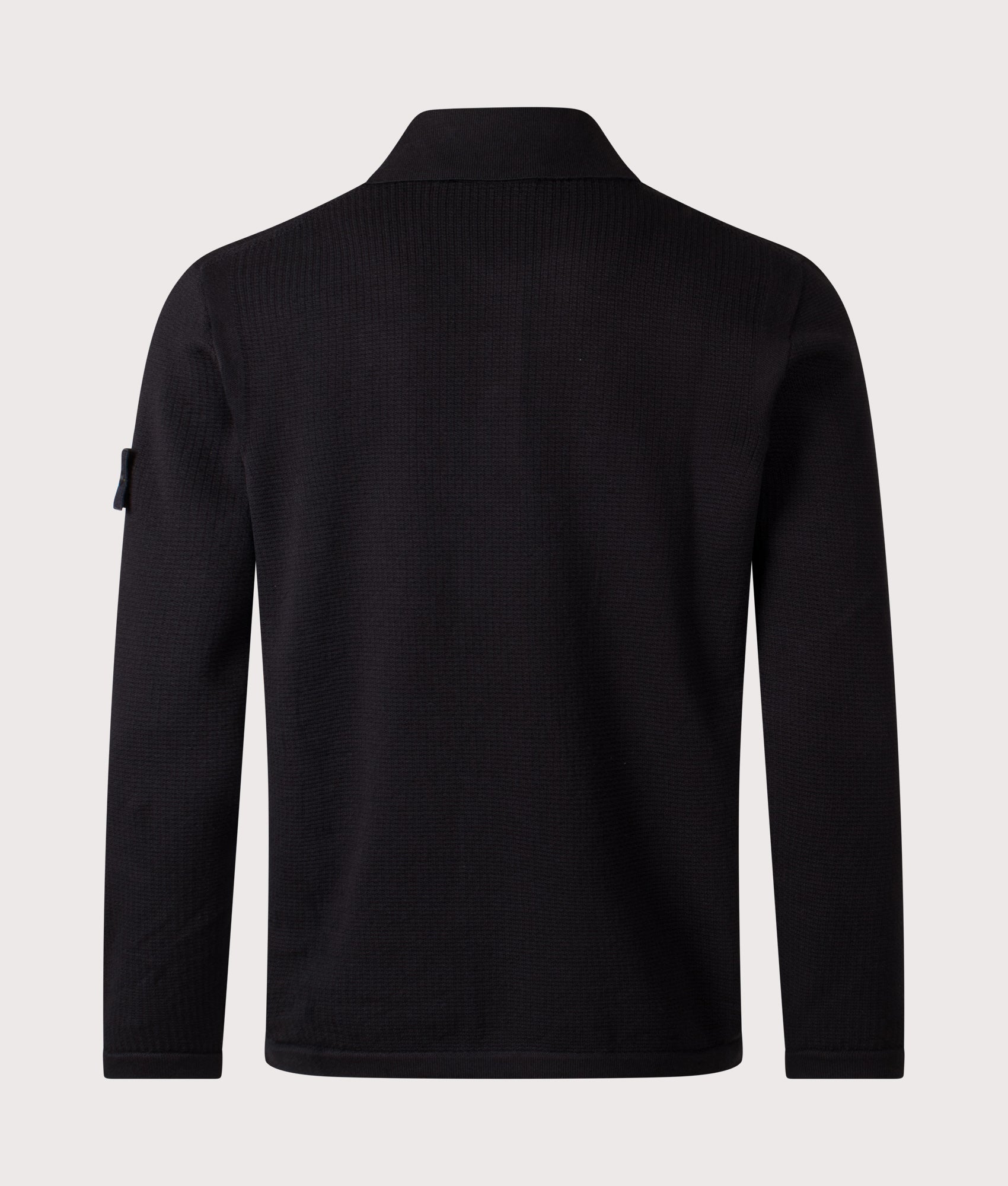 Stone Island Micro Stitch Organic Cotton Polo Shirt in Black at EQVVS Menswear. Back shot.