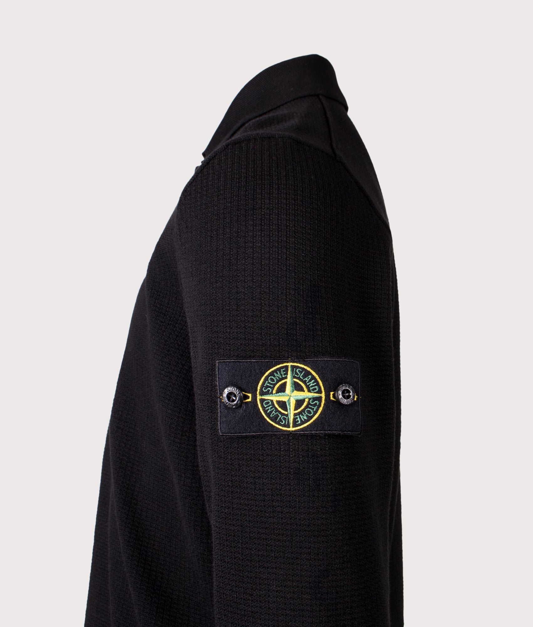 Stone Island Micro Stitch Organic Cotton Polo Shirt in Black at EQVVS Menswear. Detail shot.