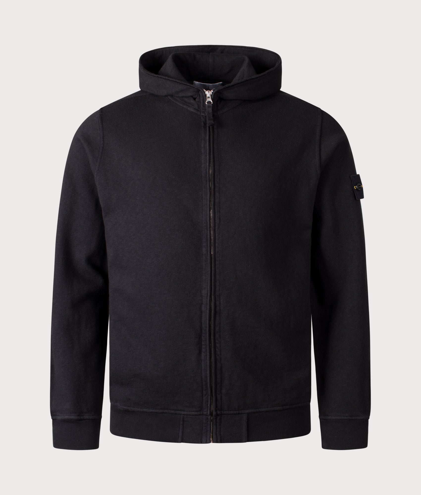 Stone Island Malfilé ‘Old’ Treatment Full Zip Hoodie in Black at EQVVS Menswear. Front shot.