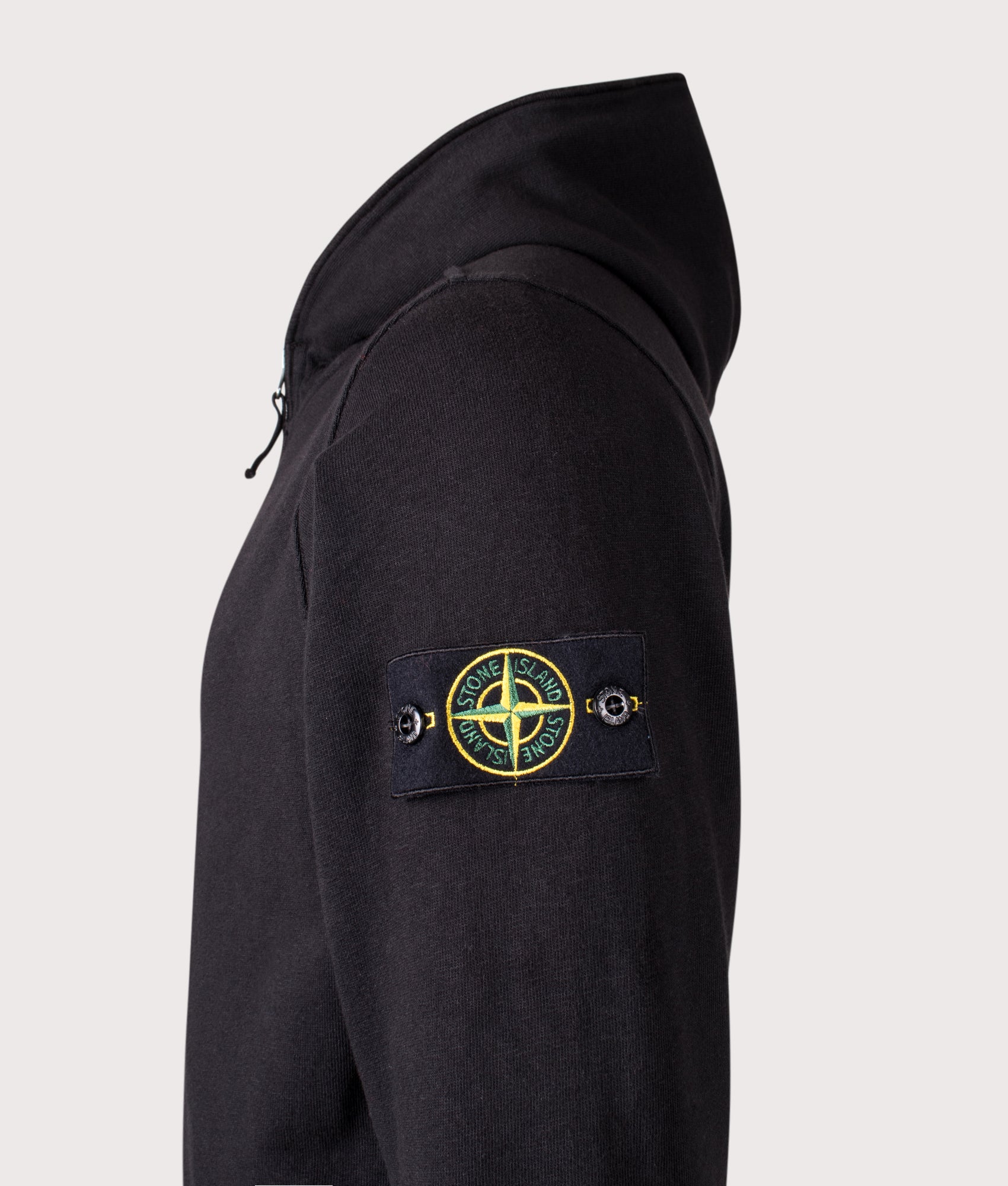 Stone Island Malfilé ‘Old’ Treatment Full Zip Hoodie in Black at EQVVS Menswear. Detail shot.