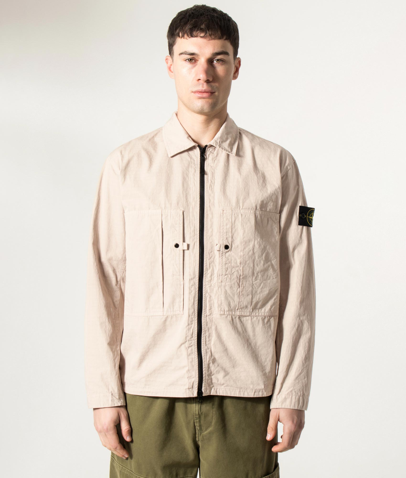 Stone Island Mercerised Organic Cotton Ripstop Overshirt in Desert Sand at EQVVS Menswear. Model front shot.