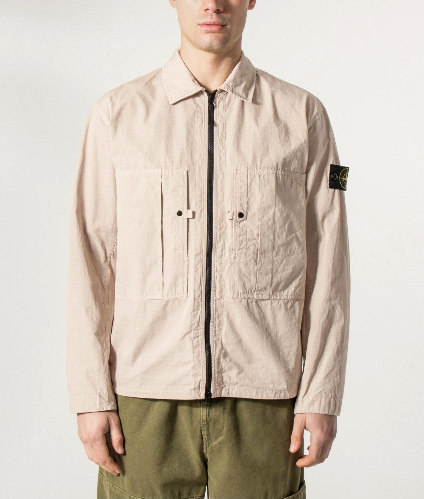 Stone Island Mercerised Organic Cotton Ripstop Overshirt in Desert Sand at EQVVS Menswear. Model front shot.