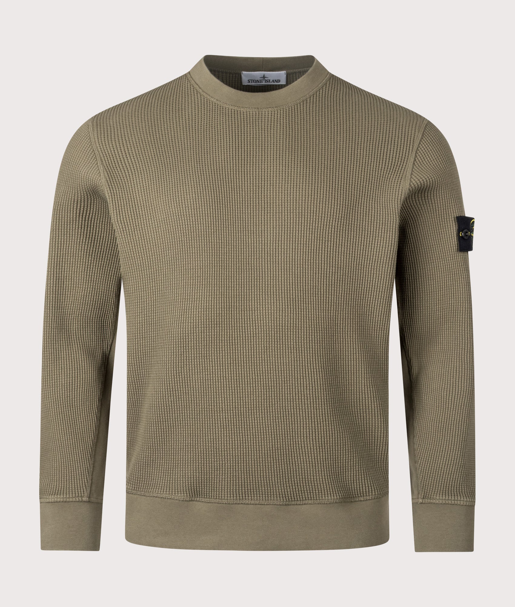 Stone Island Waffle Knit Sweatshirt in Military Green at EQVVS Menswear. Front shot.