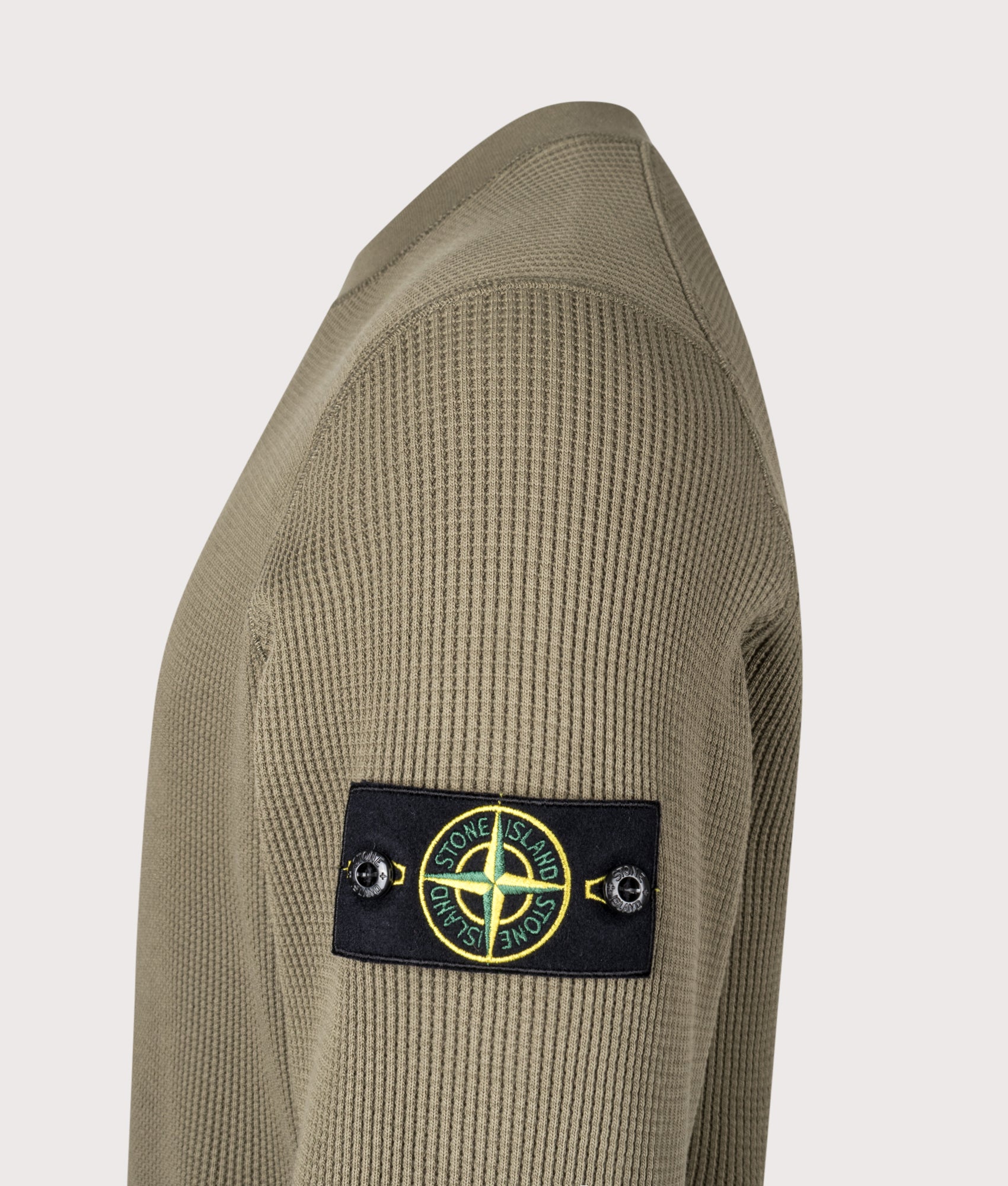 Stone Island Waffle Knit Sweatshirt in Military Green at EQVVS Menswear. Detail shot. 