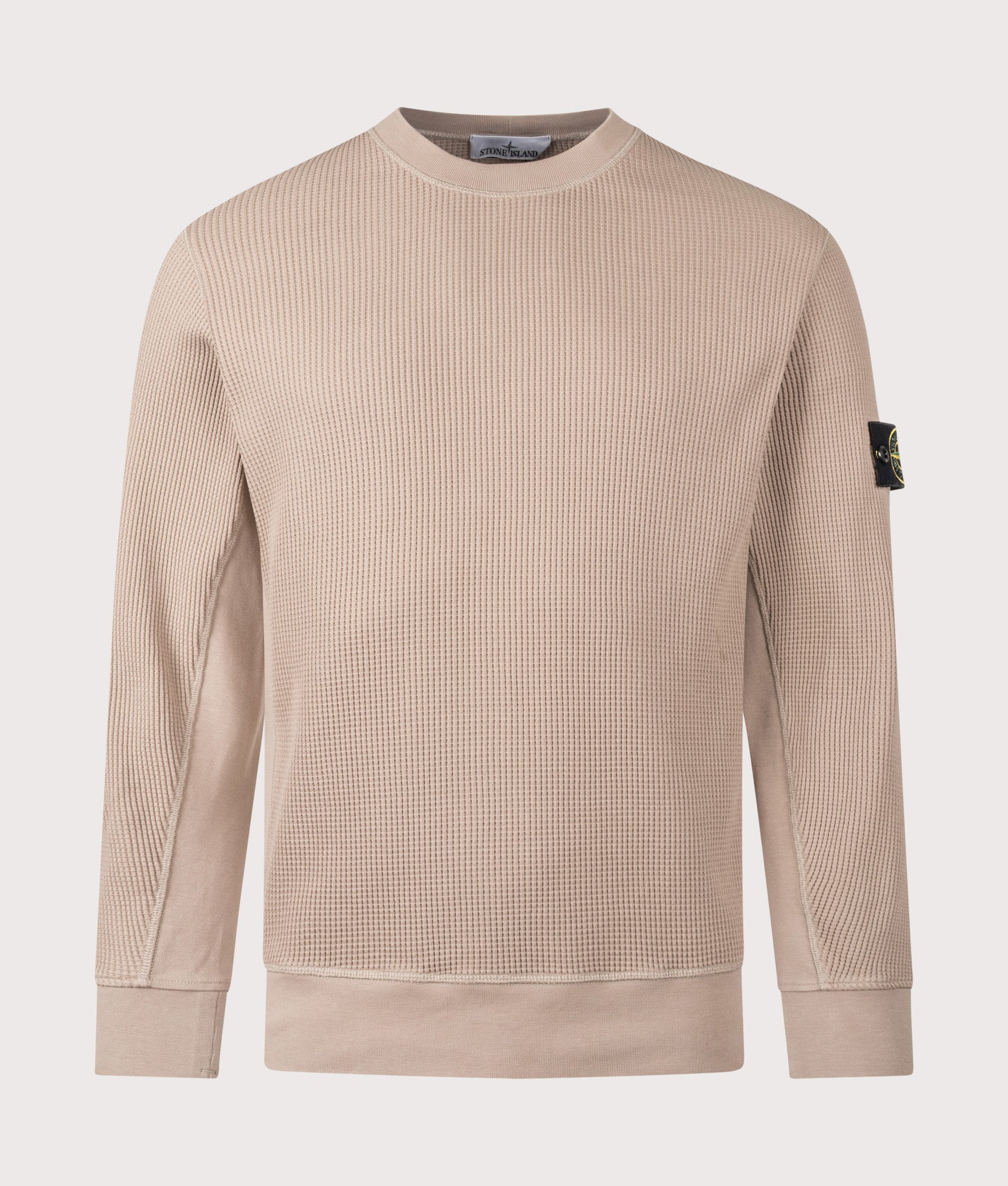 Stone Island Waffle Fleece Compass Sweatshirt in Desert Sand at EQVVS Menswear. Front shot.