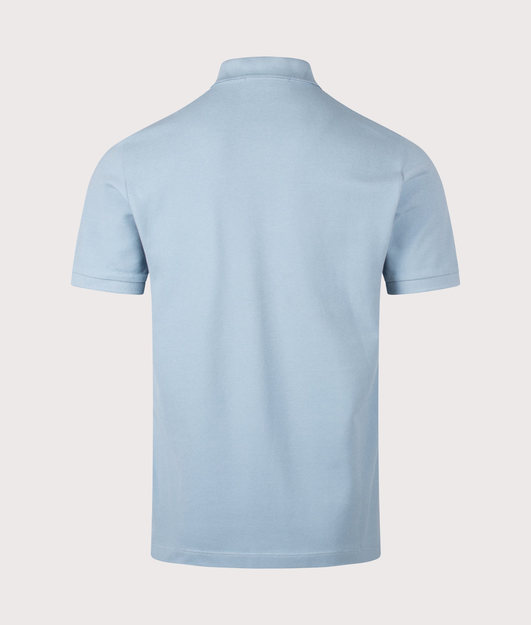 Stone Island Compass Patch Short Sleeve Polo Shirt in Powder Blue at EQVVS Menswear. Back shot.