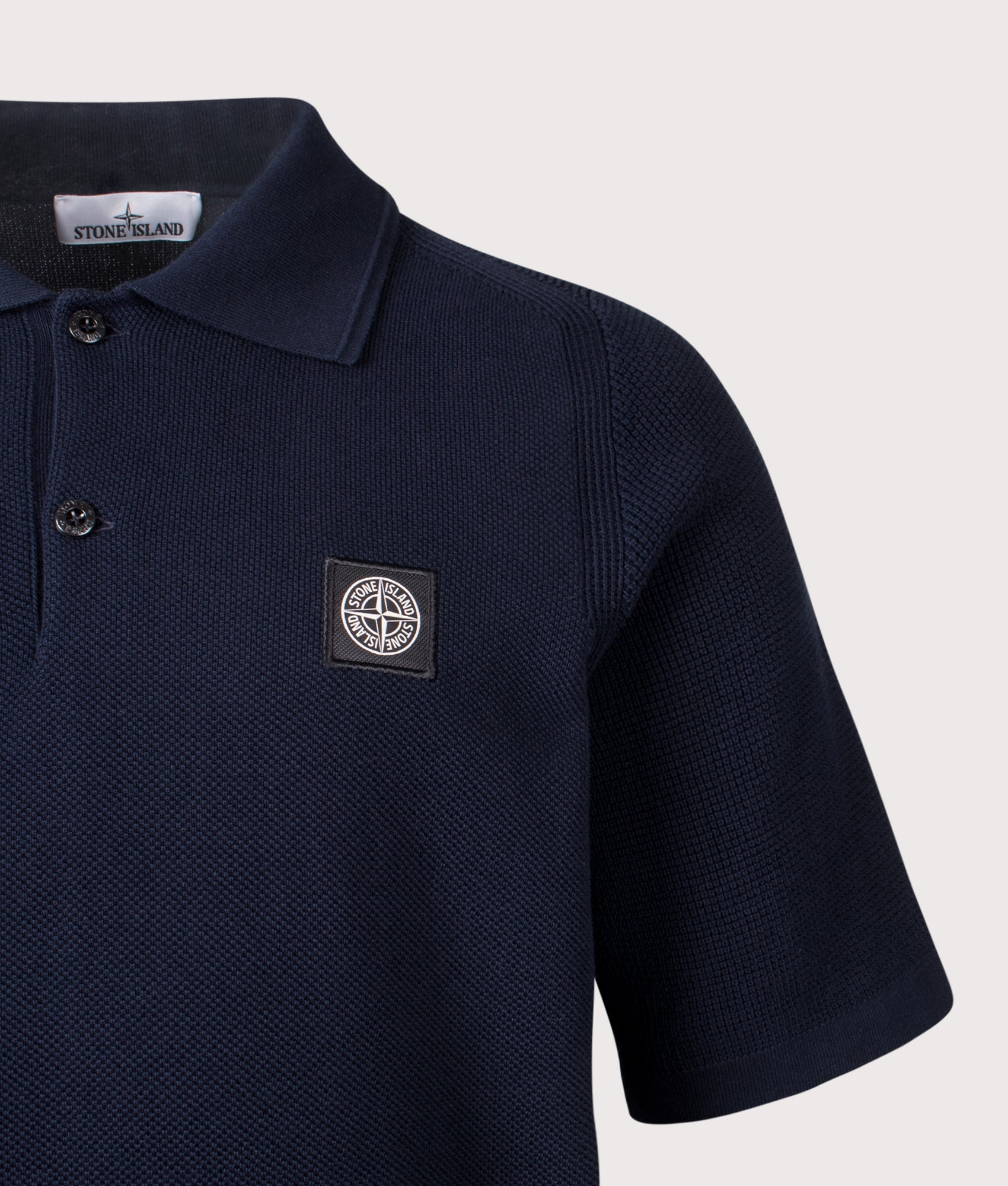 Micro Stitch Organic Cotton Compass Polo Shirt by Stone Island in Navy Blue  at EQVVS Menswear. Detail shot.
