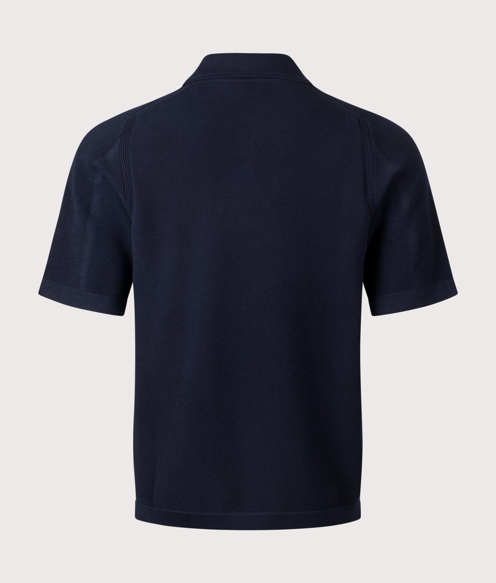 Micro Stitch Organic Cotton Compass Polo Shirt by Stone Island in Navy Blue  at EQVVS Menswear. Back shot.