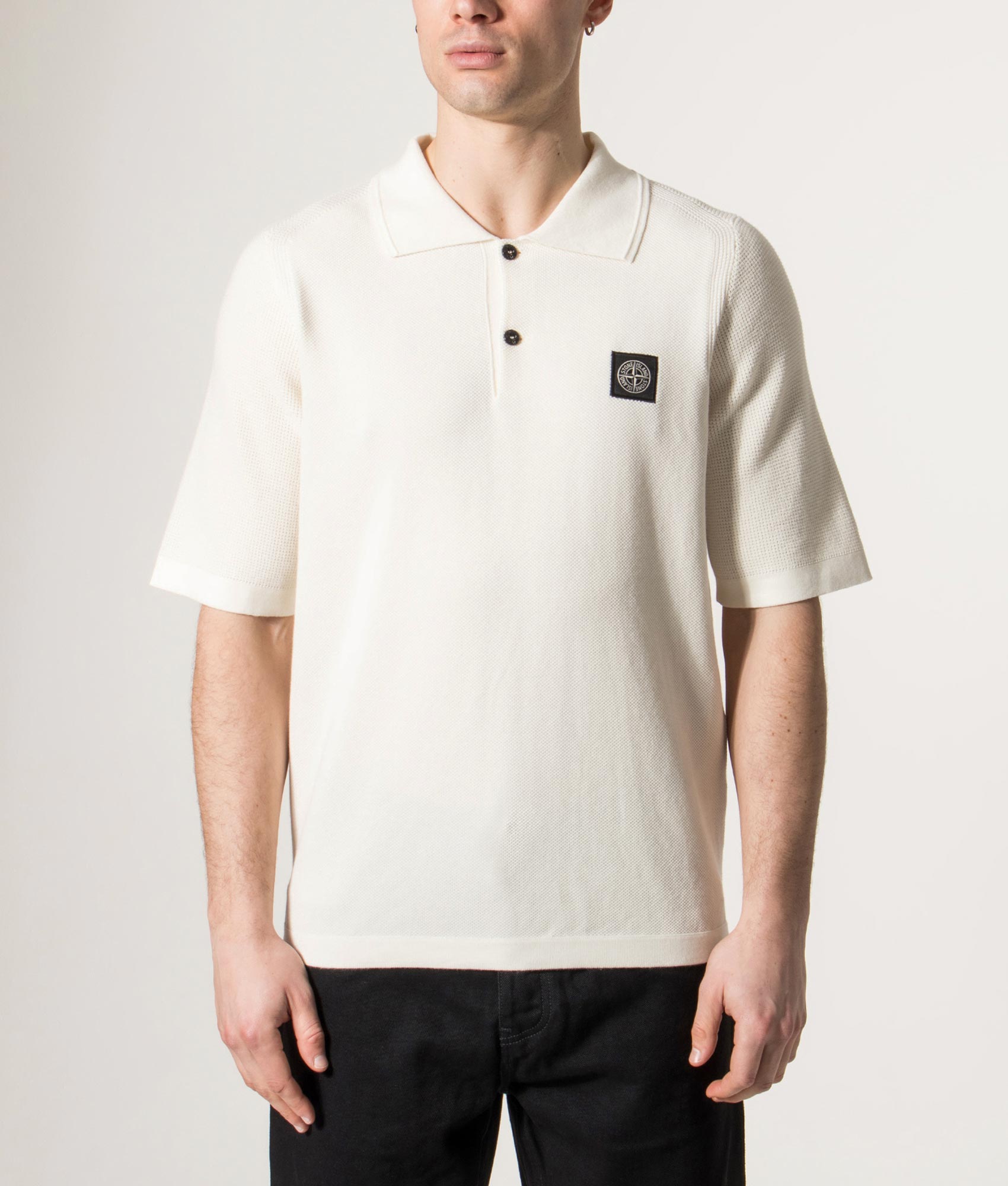 Relaxed Fit Micro Stitch Organic Cotton Compass Polo Shirt by Stone Island in Ivory at EQVVS Menswear. Model front shot.