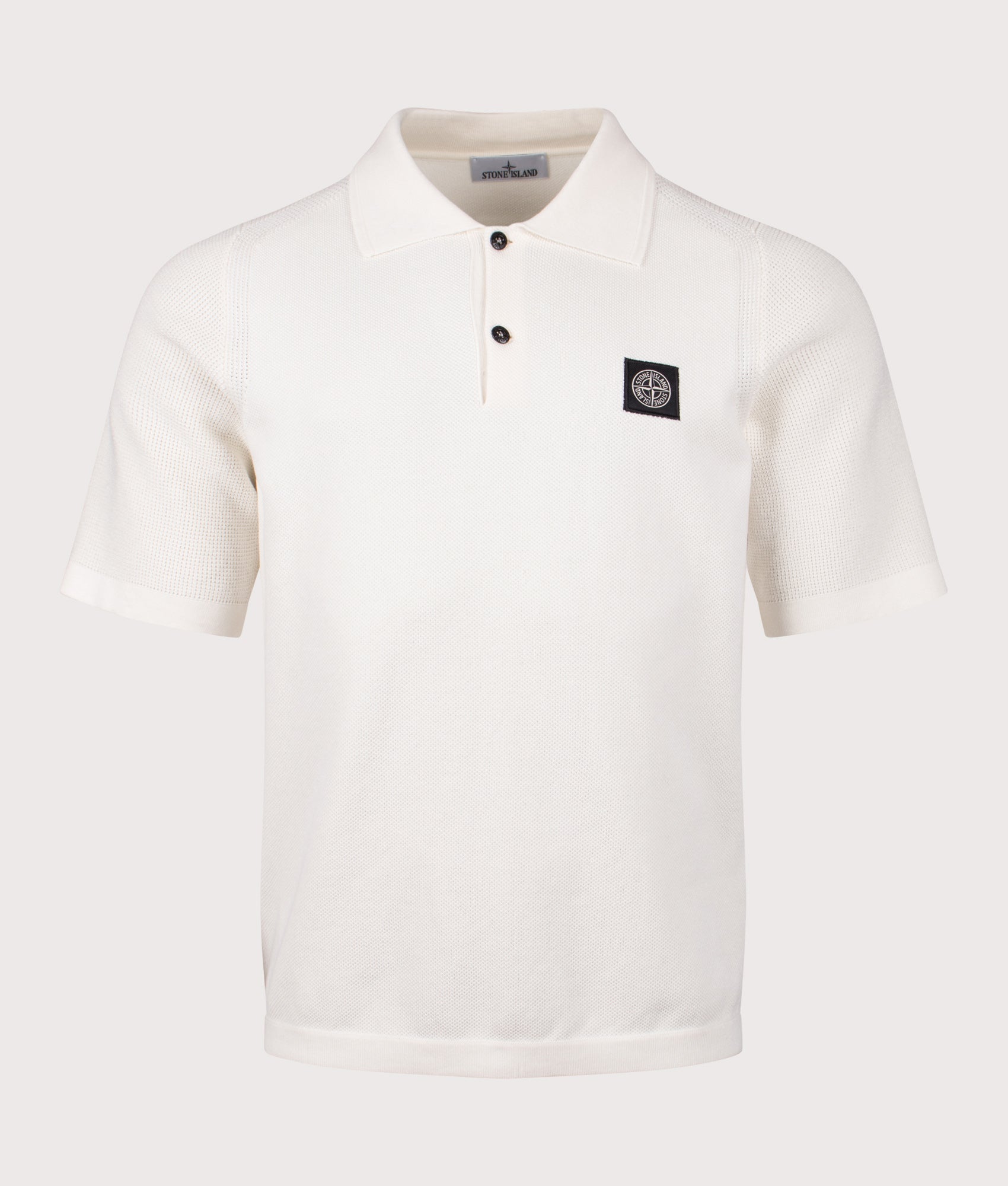 Relaxed Fit Micro Stitch Organic Cotton Compass Polo Shirt by Stone Island in Ivory at EQVVS Menswear. Front shot.