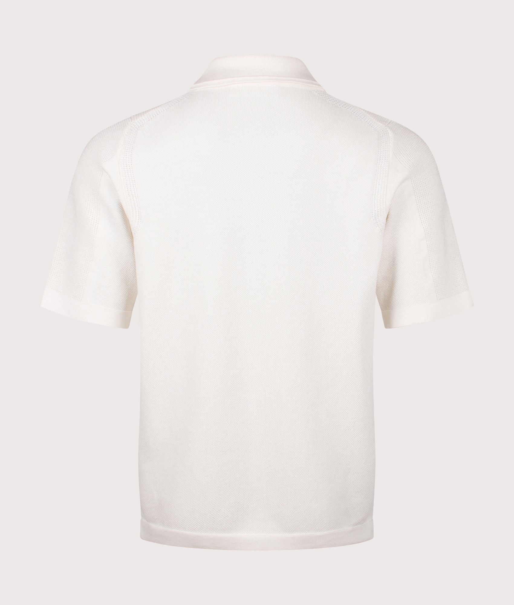 Relaxed Fit Micro Stitch Organic Cotton Compass Polo Shirt by Stone Island in Ivory at EQVVS Menswear. Back shot.