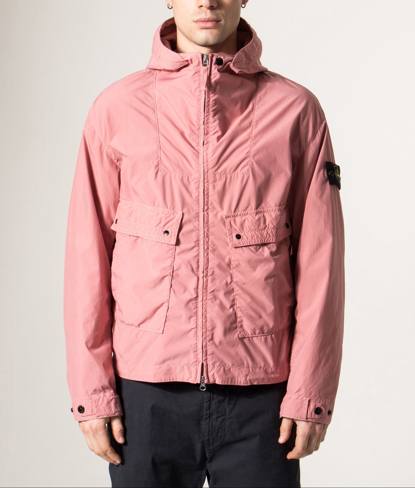 Stone Island Hooded Short Parka in Oleander at EQVVS Menswear. Model front shot.