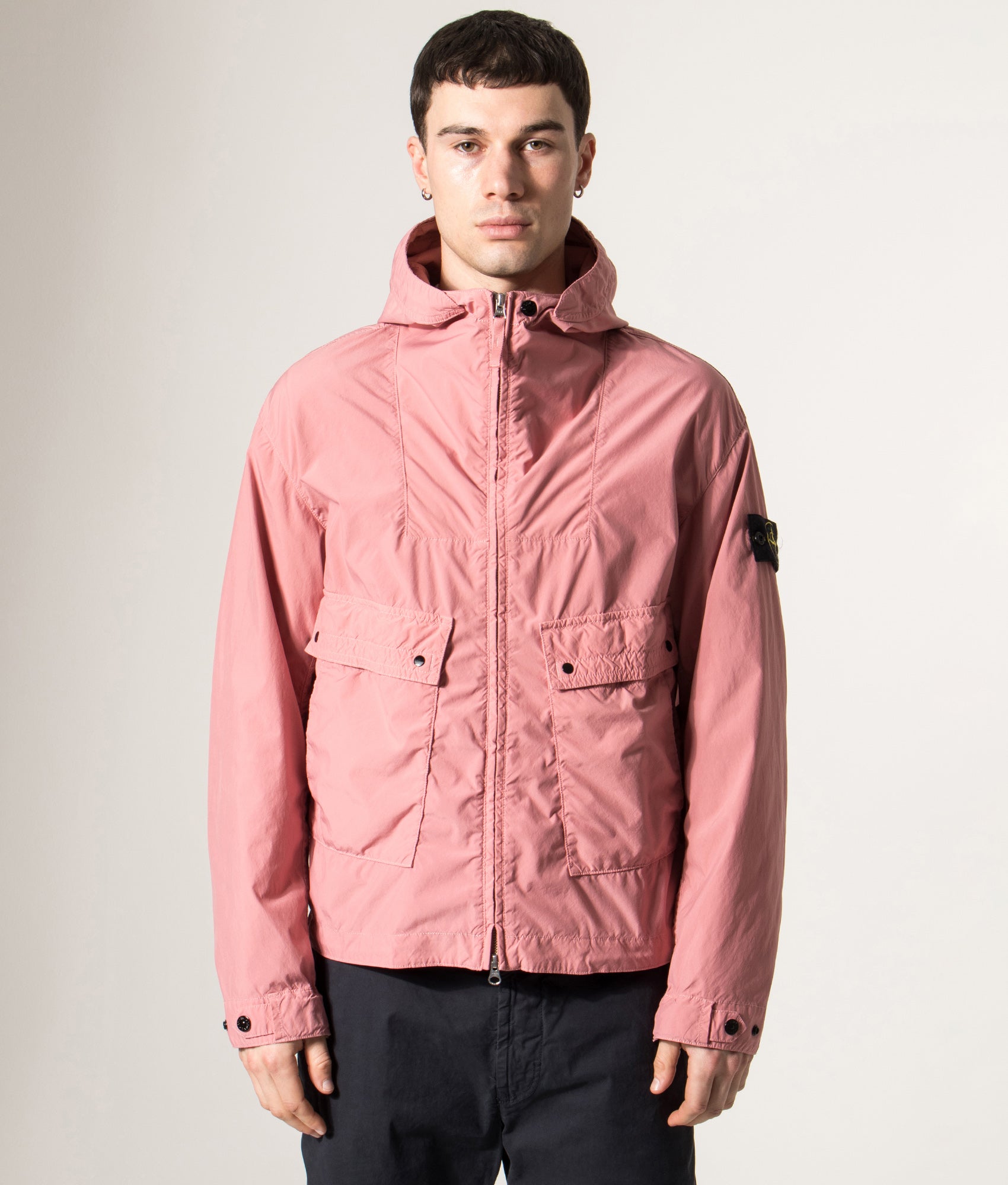 Stone Island Hooded Short Parka in Oleander at EQVVS Menswear. Model front shot.