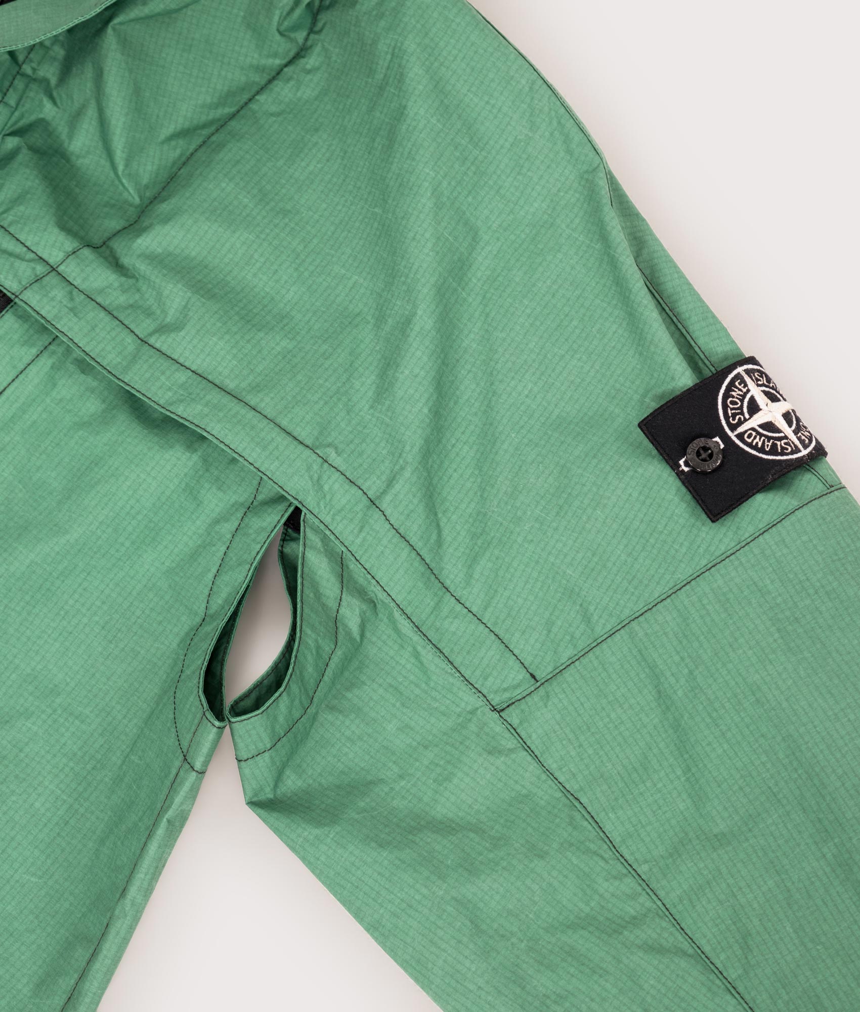 Stone Island Metal Lamina Ripstop Heat Reactive Jacket in Malachite at EQVVS Menswear. Vent shot.
