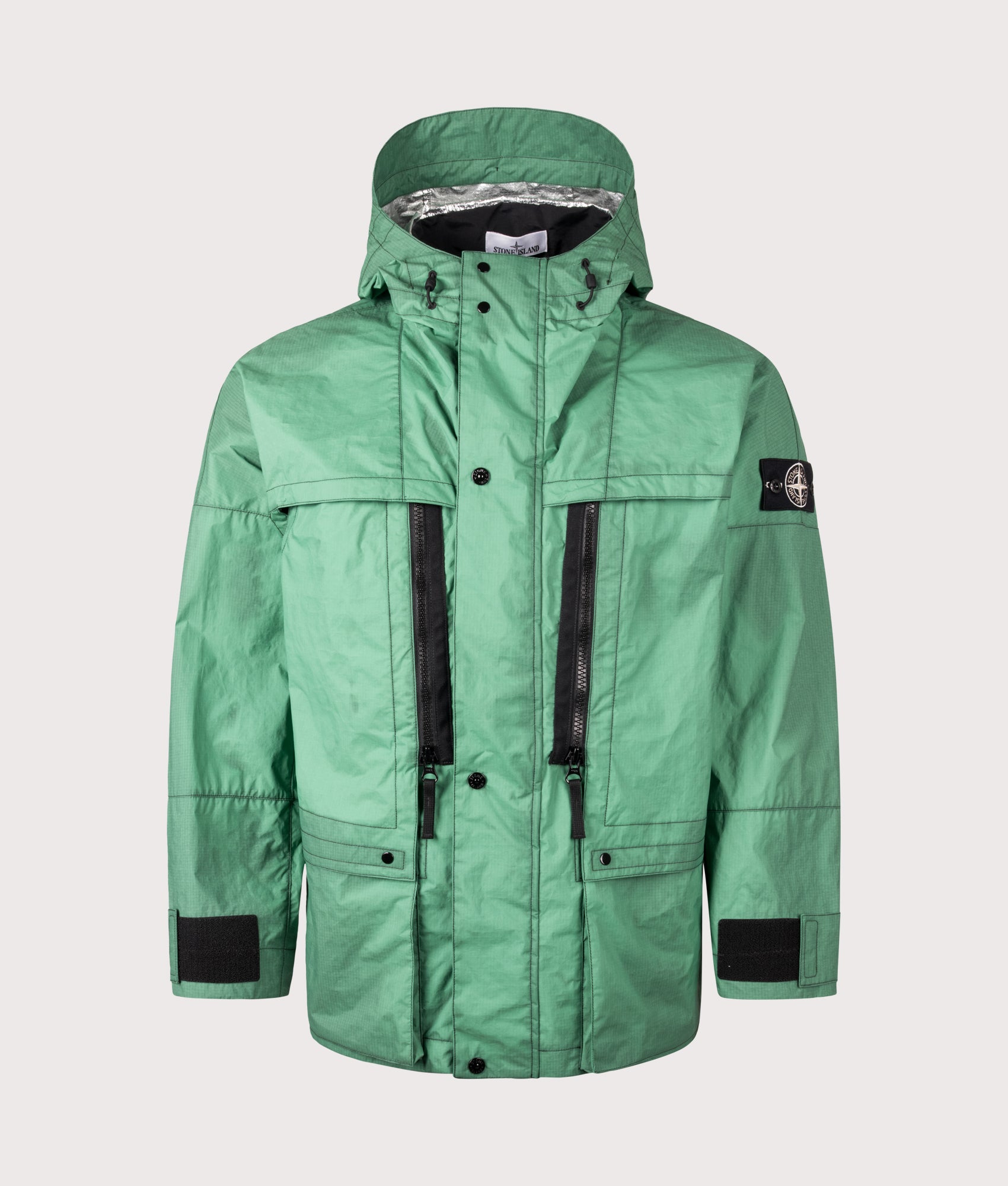 Stone Island Metal Lamina Ripstop Heat Reactive Jacket in Malachite at EQVVS Menswear. Heat reactive shot.