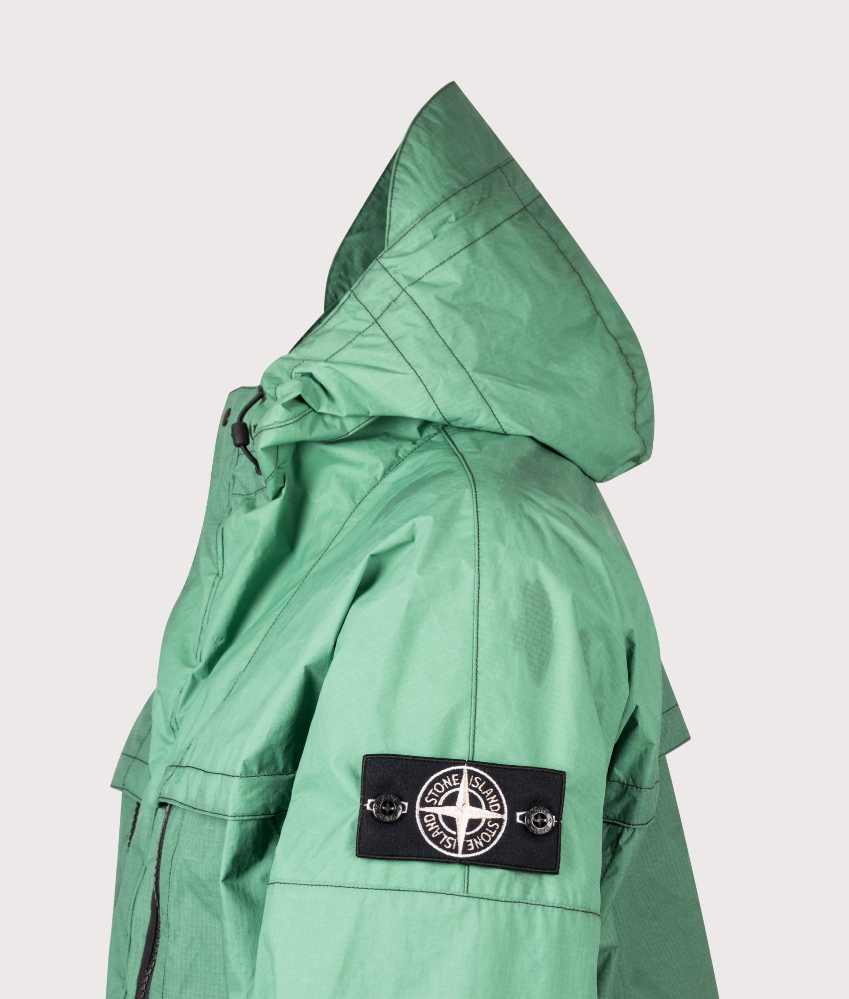 Stone Island Metal Lamina Ripstop Heat Reactive Jacket in Malachite at EQVVS Menswear. Heat reactive shot. 