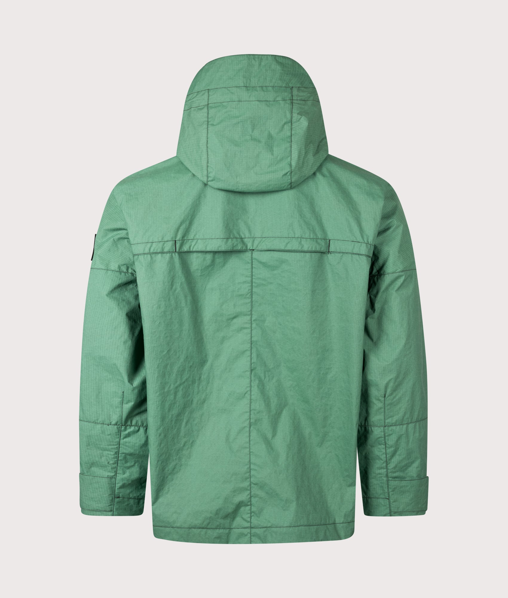 Stone Island Metal Lamina Ripstop Heat Reactive Jacket in Malachite at EQVVS Menswear. Heat reactive shot.