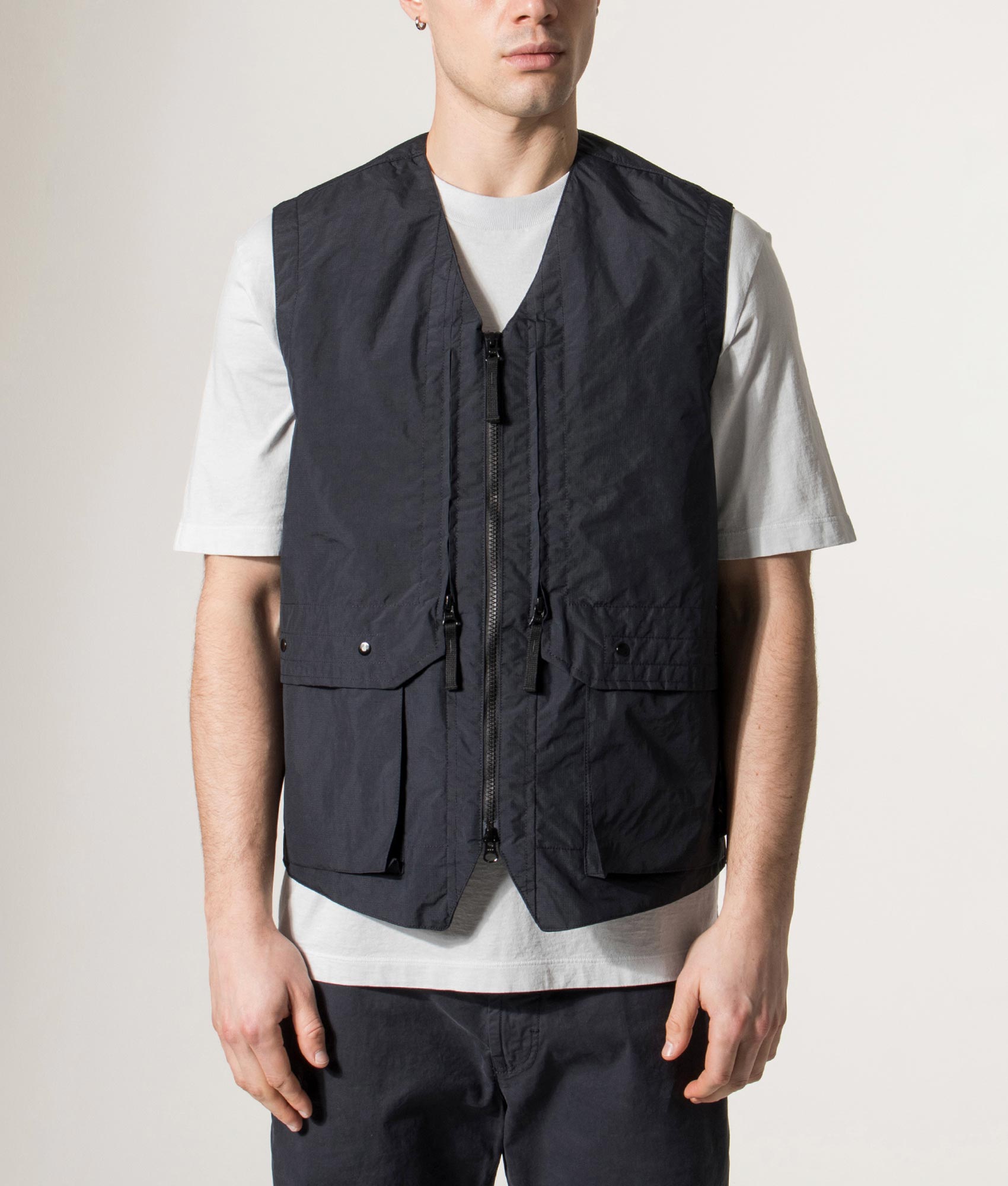 Stone Island Metal Lamina Poly Ripstop Vest in Navy Blue at EQVVS Menswear.