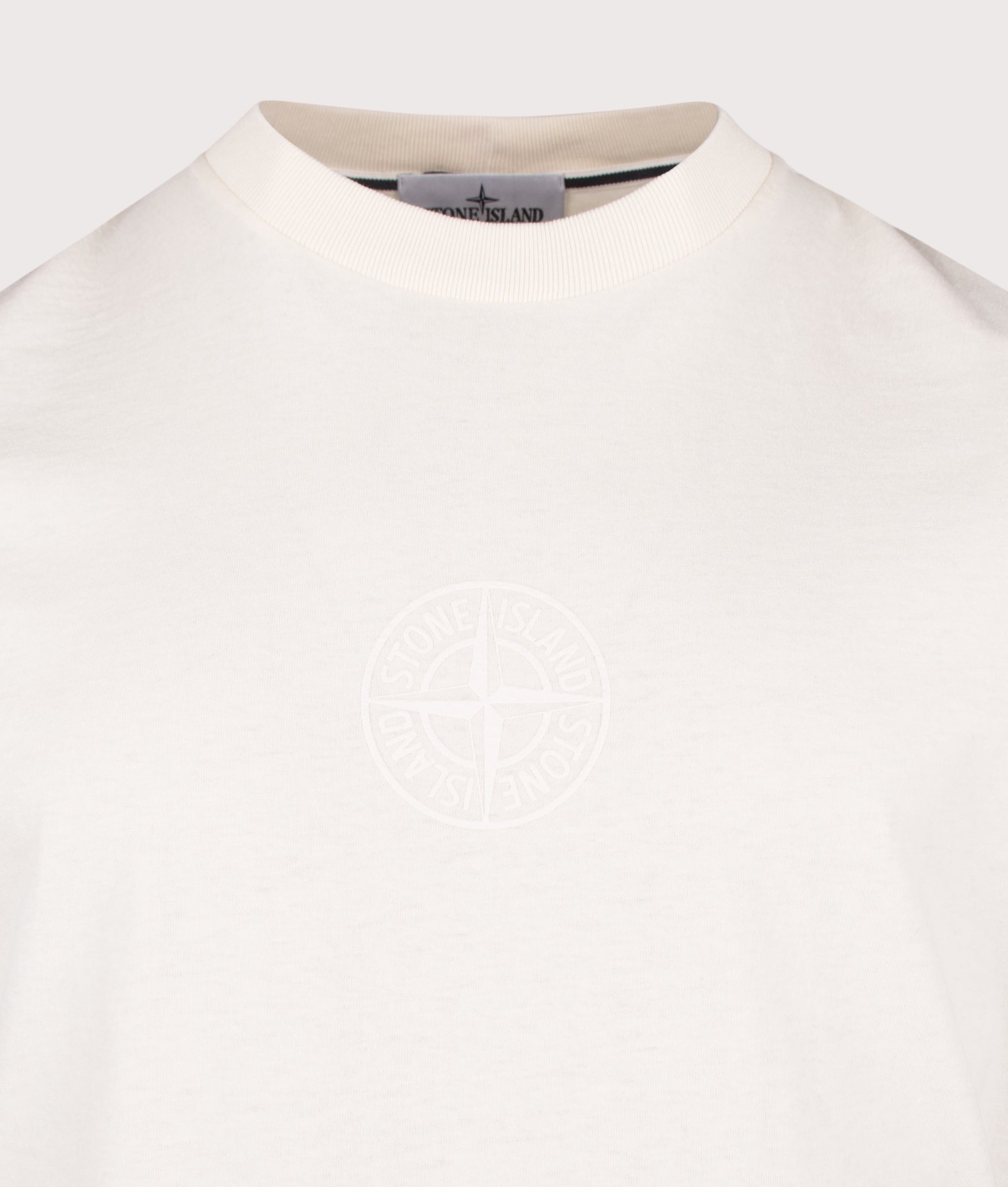 Stone Island ‘Camo Compass’ Print T-Shirt in Ivory at EQVVS Menswear. Detail shot.