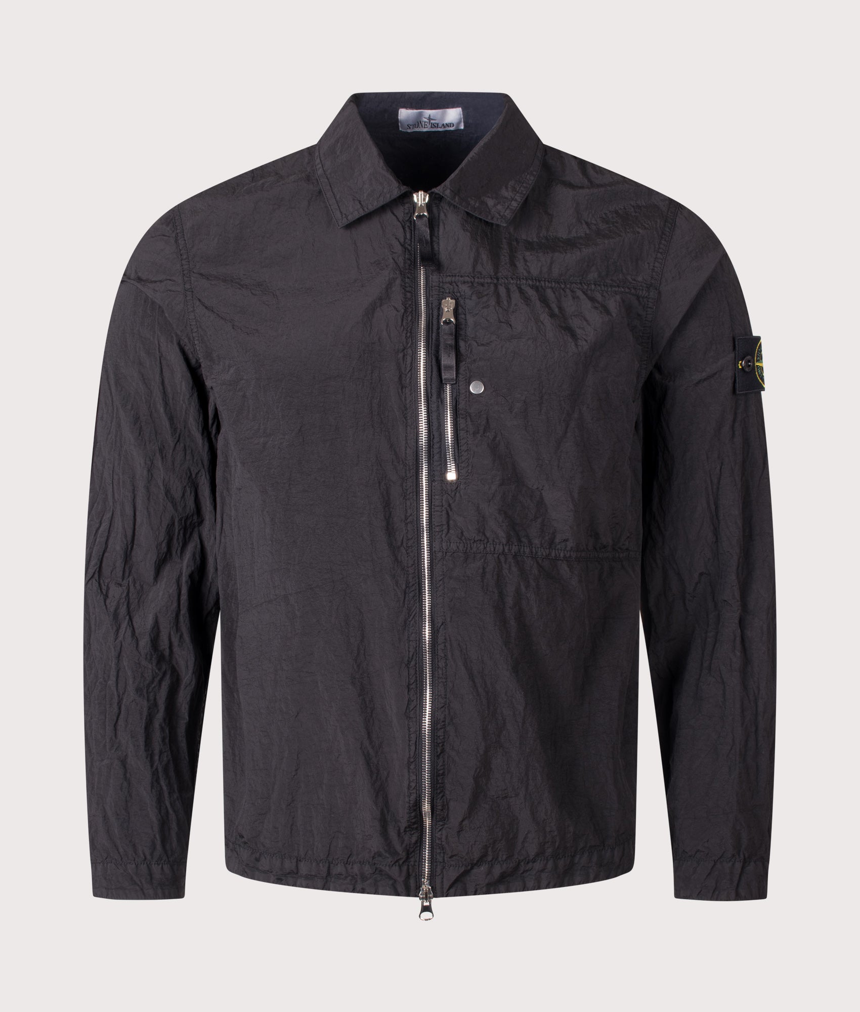 Stone Island Nylon Metal in ECONYL® Overshirt in Black at EQVVS Menswear. Front shot.