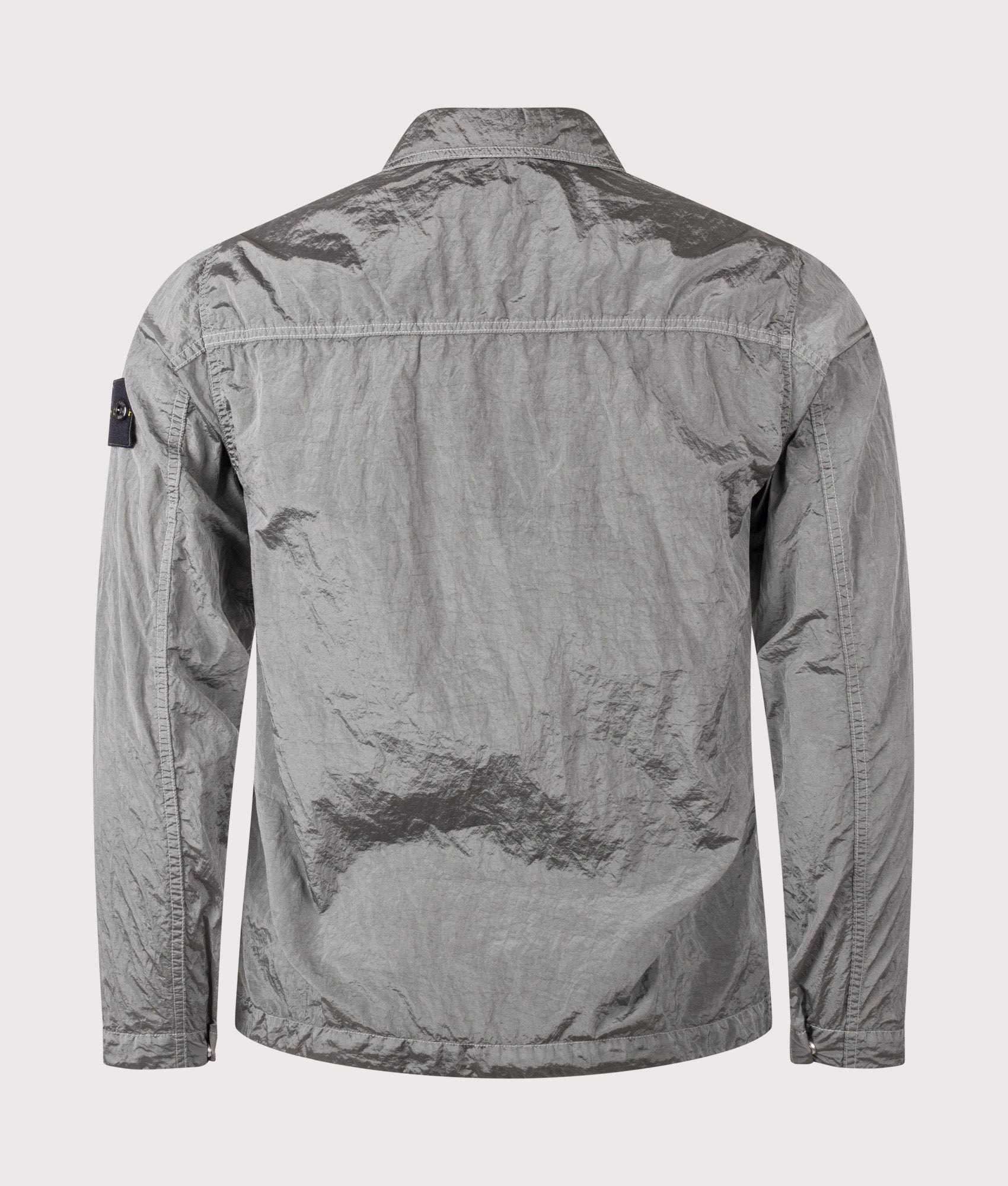 Stone Island Nylon Metal in ECONYL® Overshirt in Pearl Grey at EQVVS Menswear. Back shot.