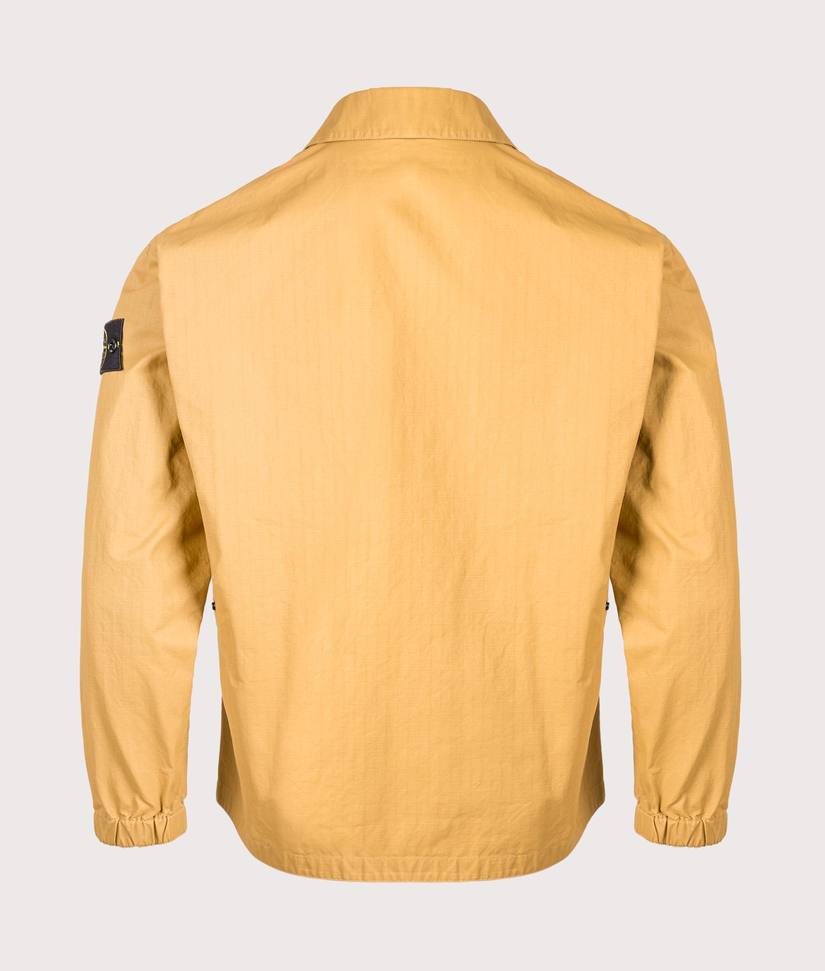 Stone Island Relaxed Fit Double Coated Cotton Ripstop Overshirt in Mustard at EQVVS Menswear.  Back shot 