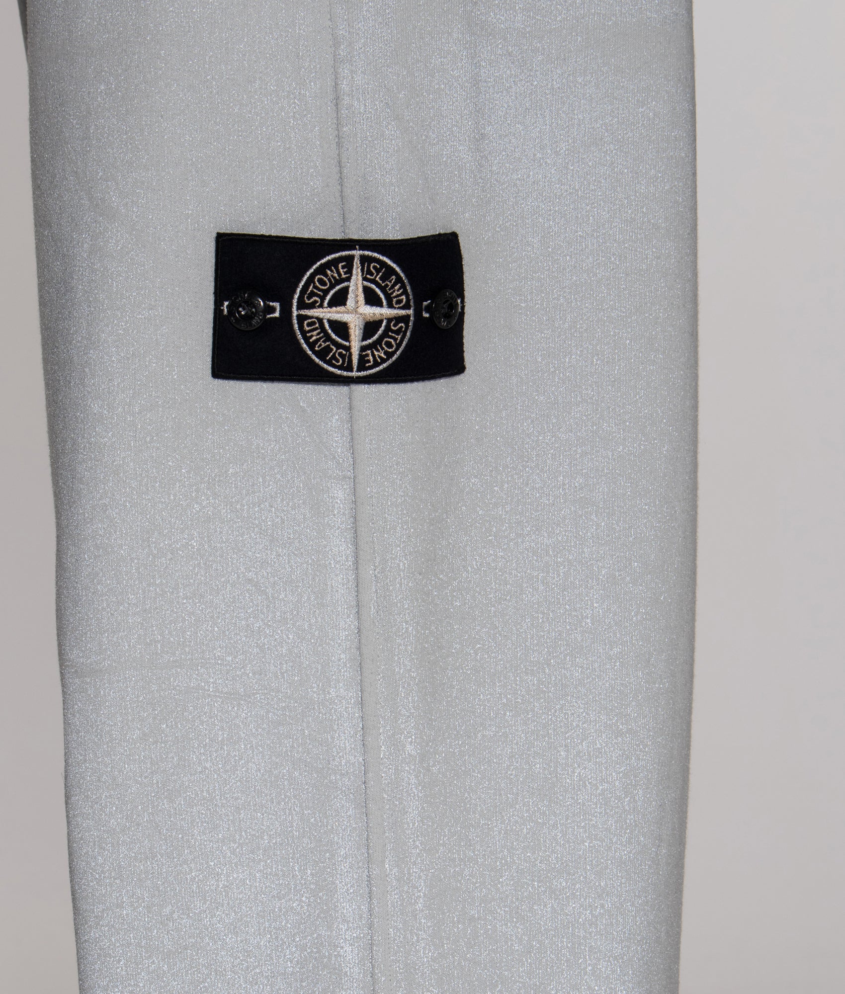 Loose Fit Reflect Joggers in Sky Blue | Stone Island | EQVVS | Side model detail shot 2