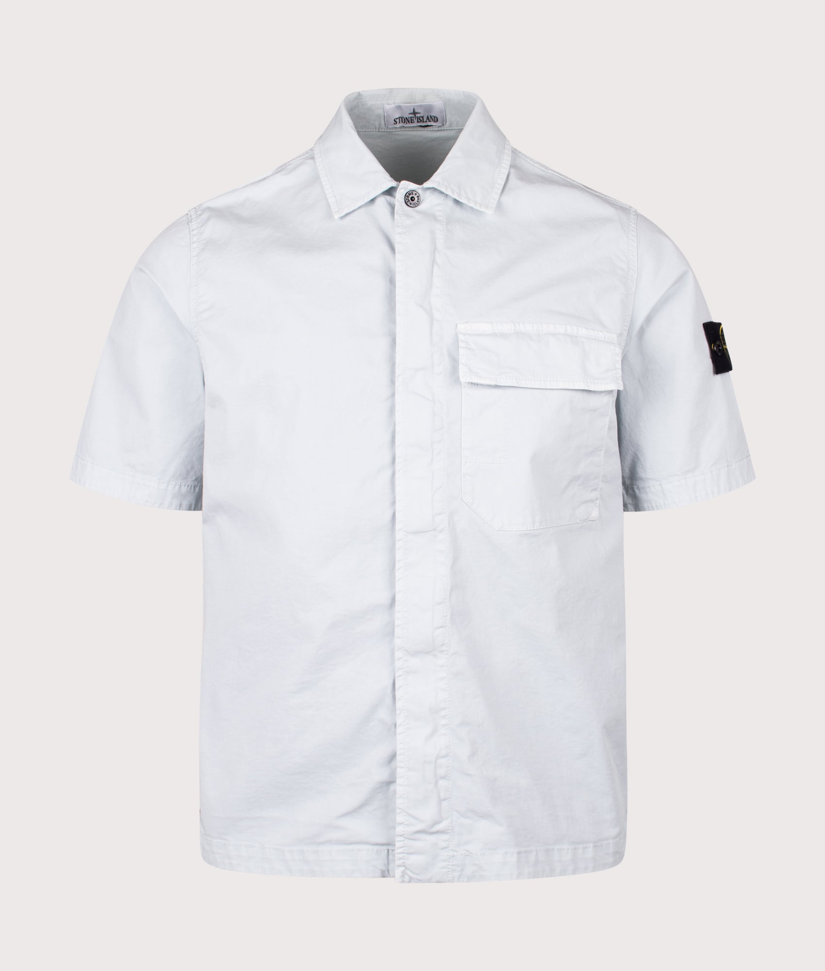 Stone Island Short Sleeve Shirt in Sky Blue at EQVVS Menswear. Front shot.
