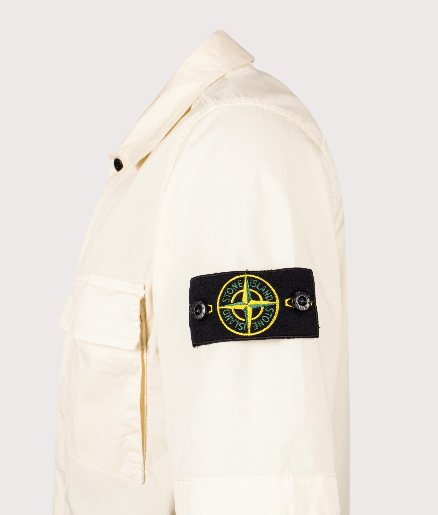Stone Island Relaxed Fit Short Sleeve Shirt in Ivory at EQVVS Menswear. Detail shot.