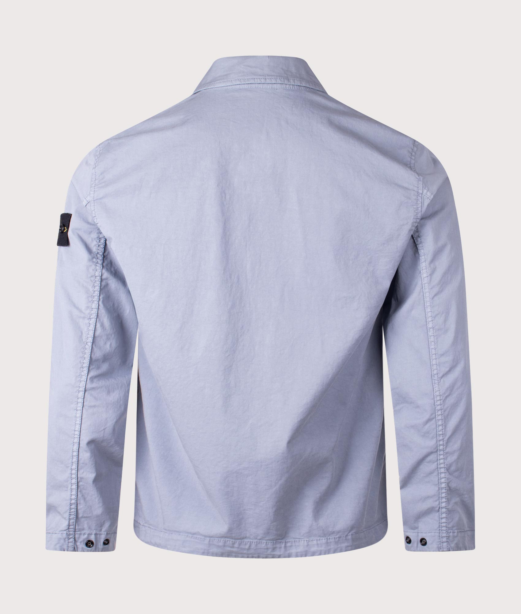 Stone Island Stretch Organic Cotton Twill Overshirt in Avio Blue at EQVVS Menswear. Back shot.