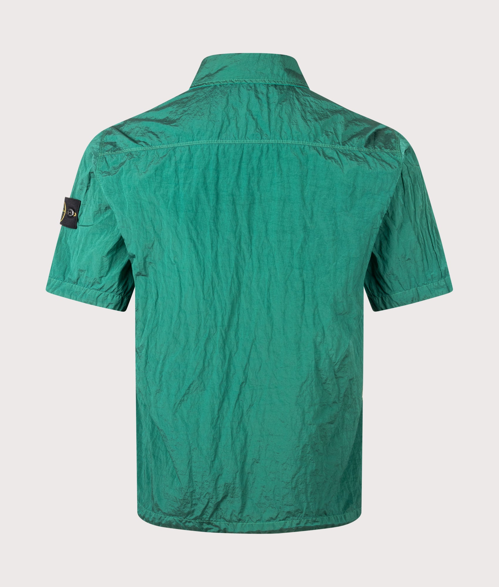 Stone Island Comfort Fit Nylon Metal in ECONYL® Short Sleeve Shirt in V005H Malachite at EQVVS Menswear. Back shot.