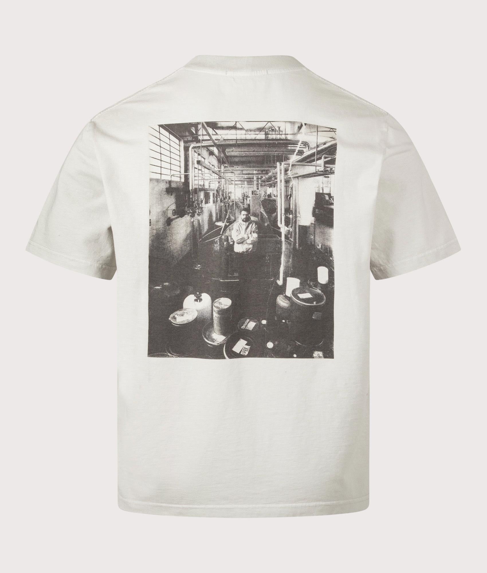 Stone island Carlo Rivetti T-Shirt in Pearl Grey at EQVVS Menswear. Back shot.