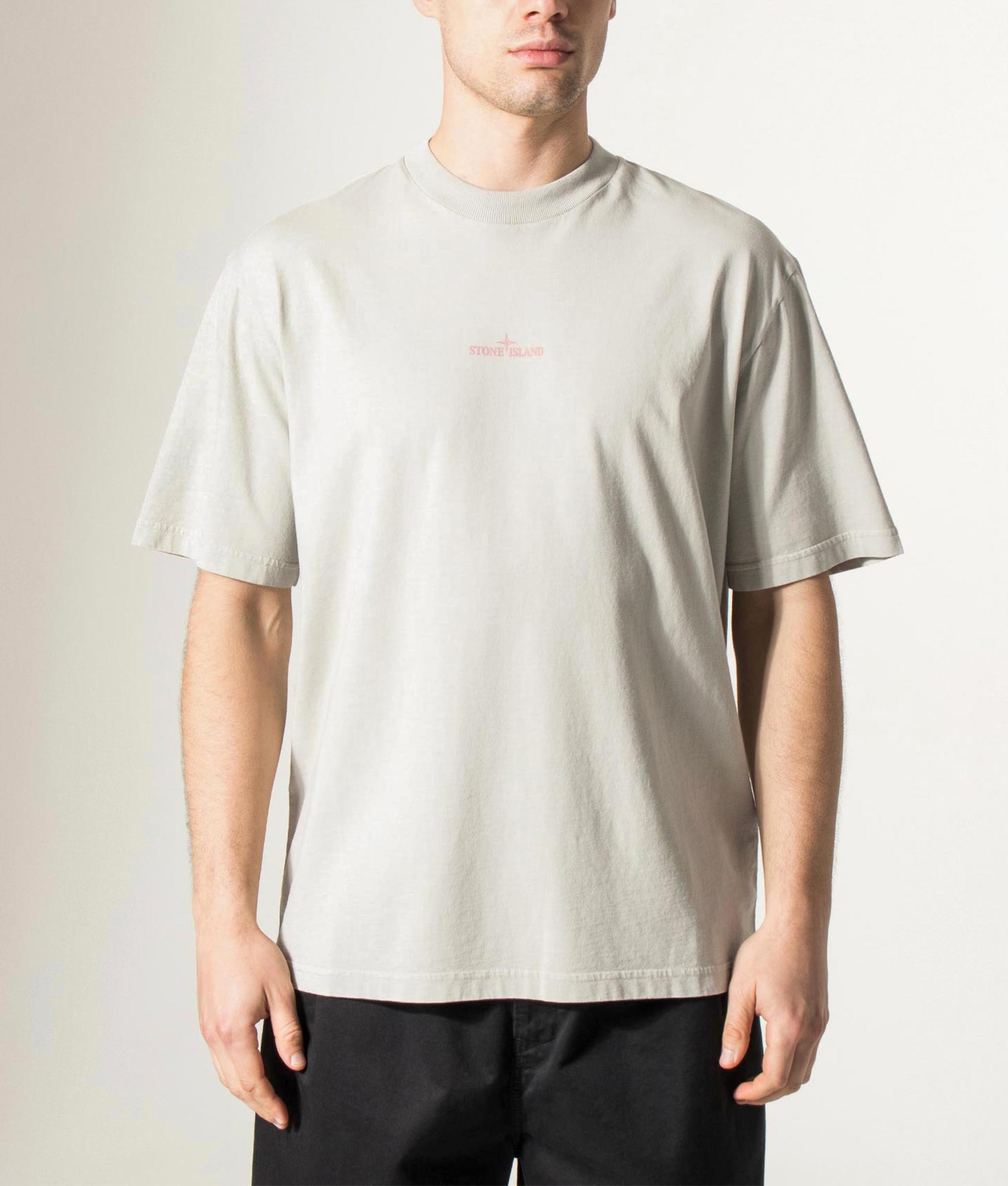 Stone island Carlo Rivetti T-Shirt in Pearl Grey at EQVVS Menswear. Model front shot.