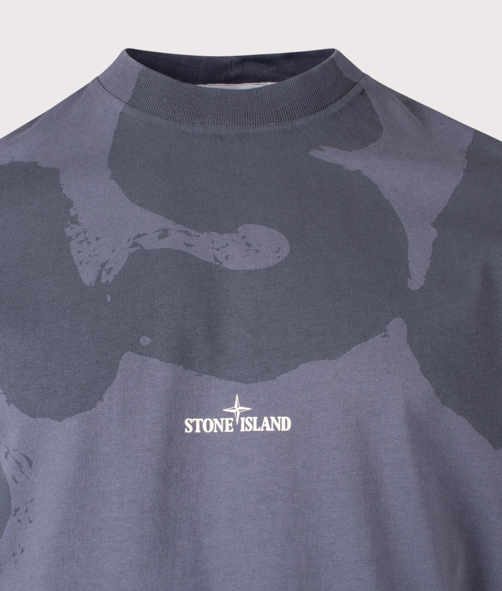 Stone Island ‘Whirlwind Type’ Print T-Shirt in Blue Grey at EQVVS Menswear. Detail shot.