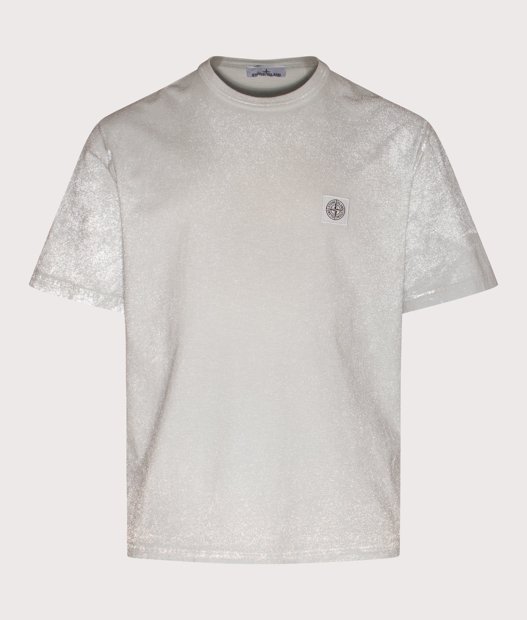 Stone Island Reflective Compass Badge T-Shirt in Sky Blue at EQVVS Menswear.  Reflective front shot.