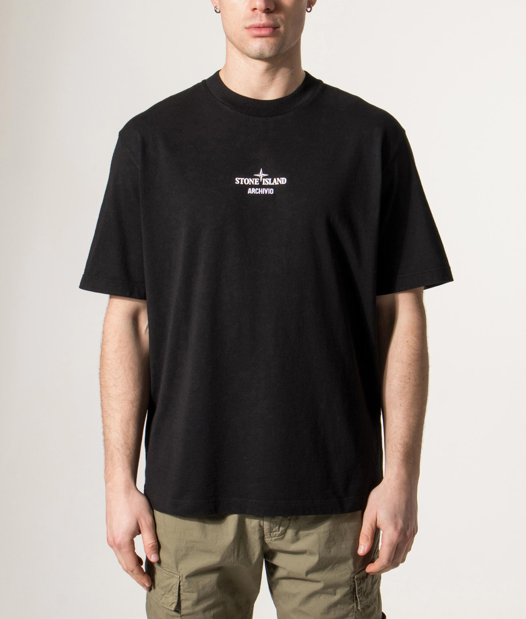 Stone Island ‘Archivio’ print T-Shirt in Black at EQVVS Menswear. Model front shot.