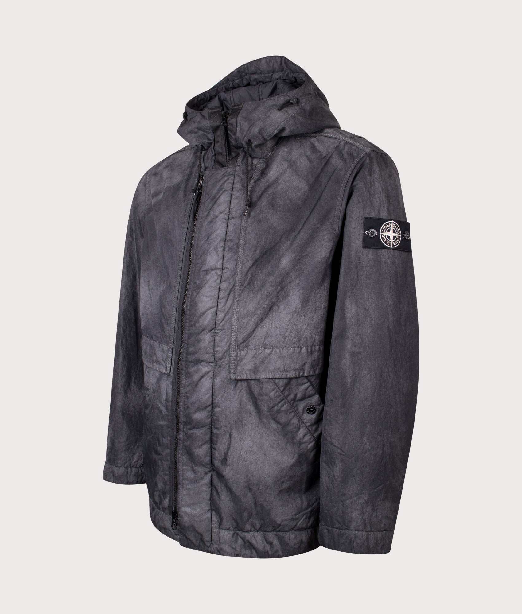 Stone Island Dense Nylon-TC Hand Sprayed Reflective Jacket in Black at EQVVS Menswear. Angled front shot.