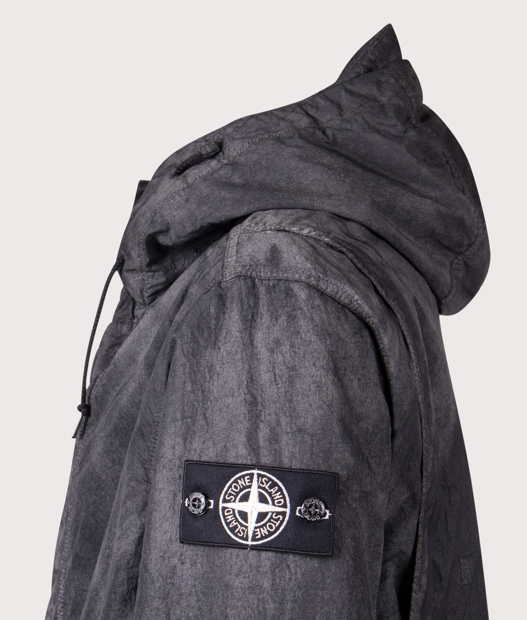 Stone Island Dense Nylon-TC Hand Sprayed Reflective Jacket in Black at EQVVS Menswear. Detail shot.
